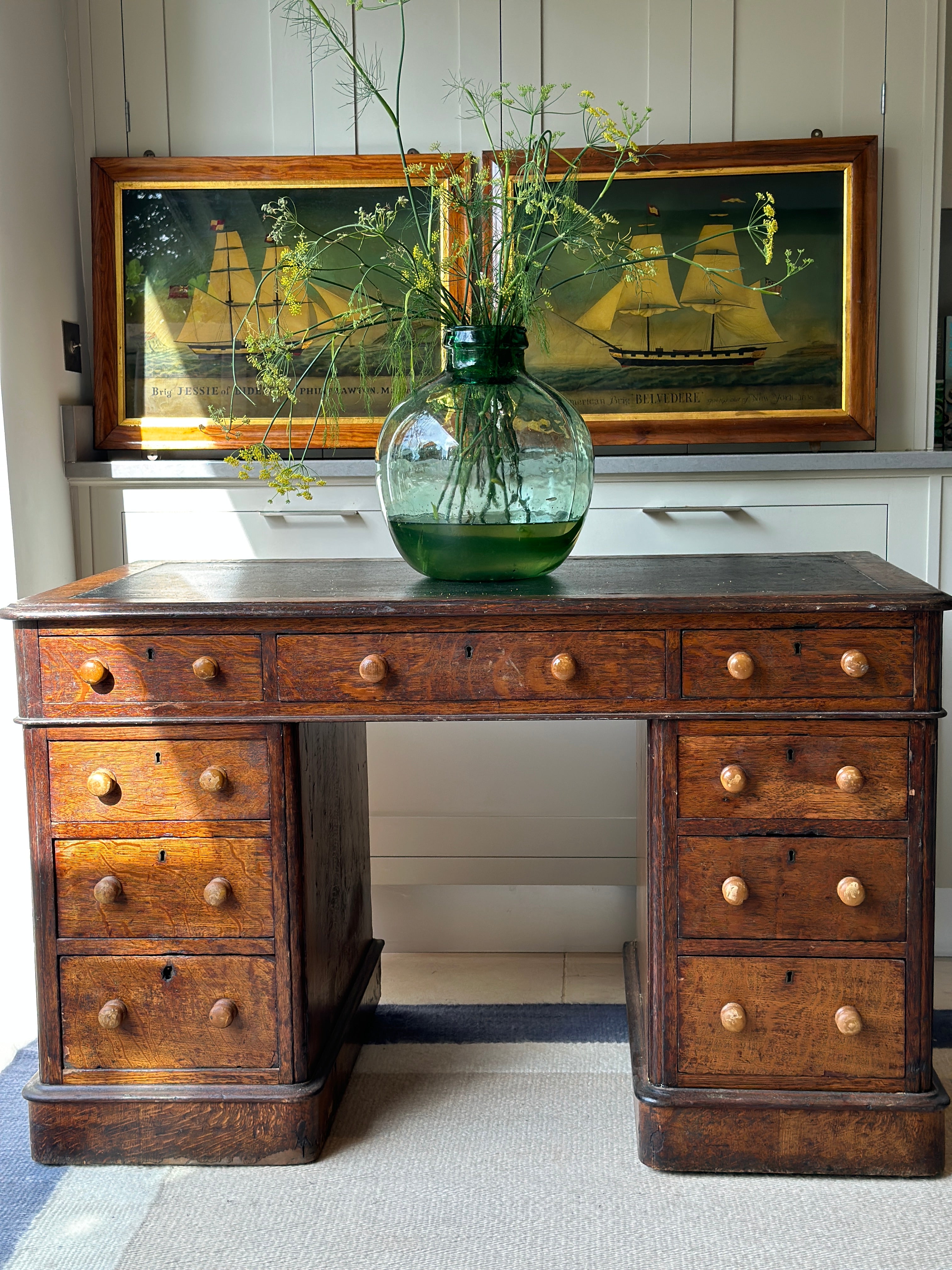 Antique Oak Desk with leather top on castors