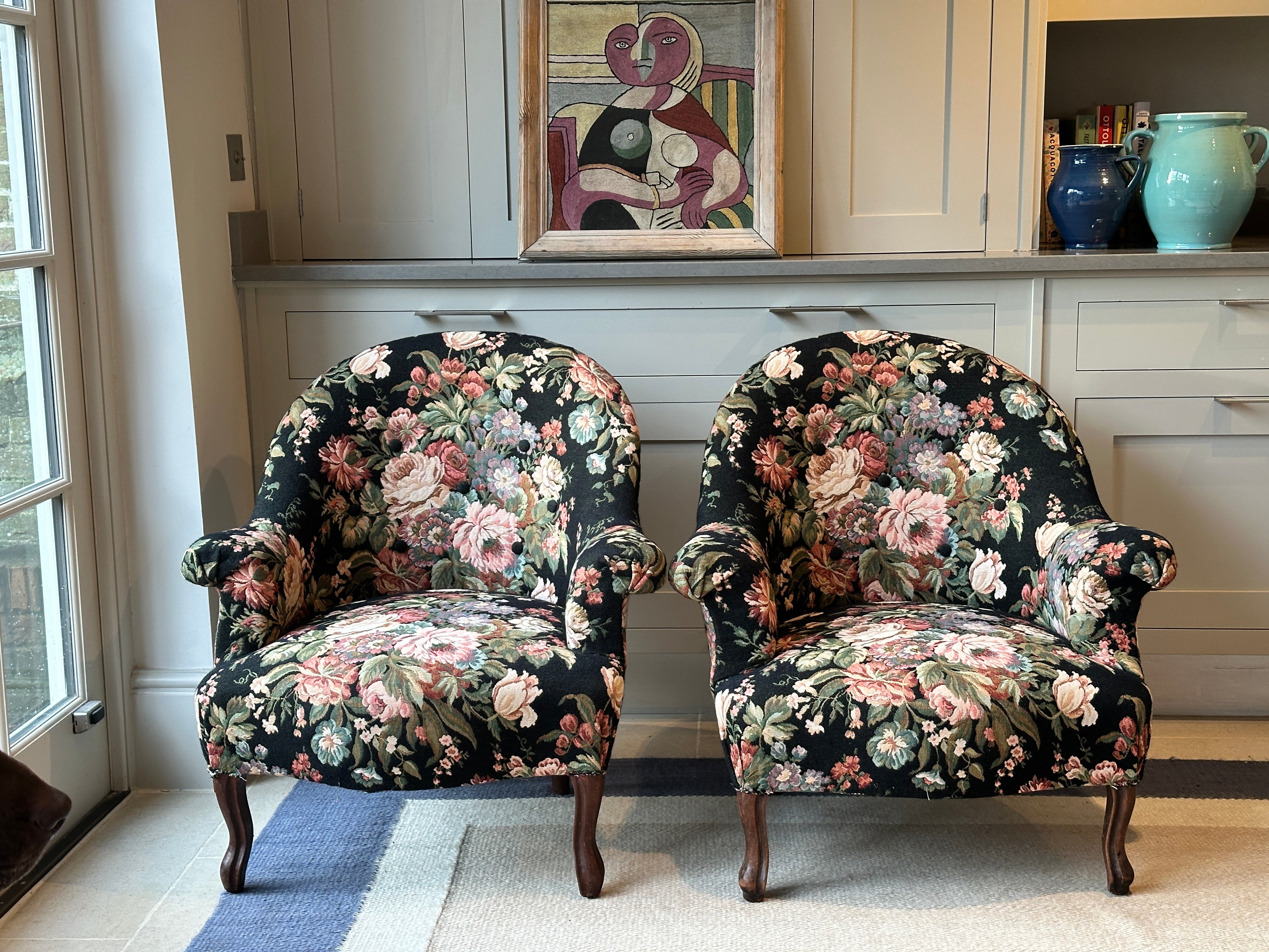 Pair of French Tub Chairs with original black floral tapestry fabric.