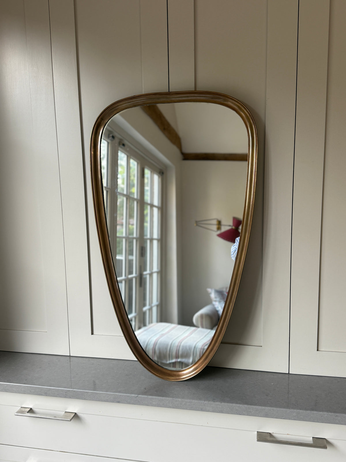 Brass Shield Mirror. Italy 1950s. 80 x 47cm