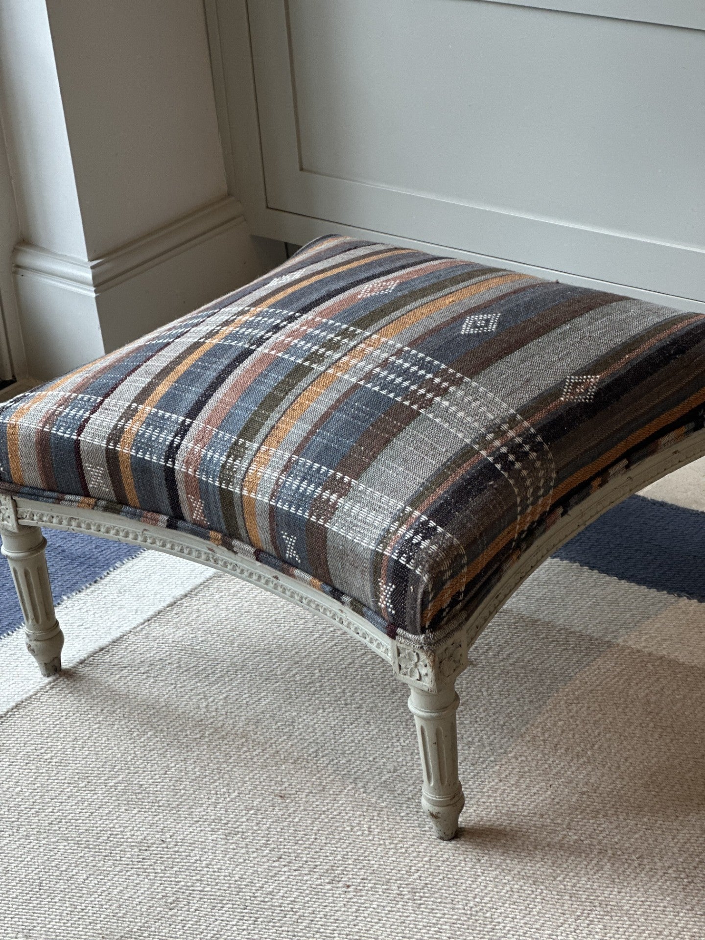 French Ottoman Reupholstered in a Gujarat Embroidered Camel Wool Shawl