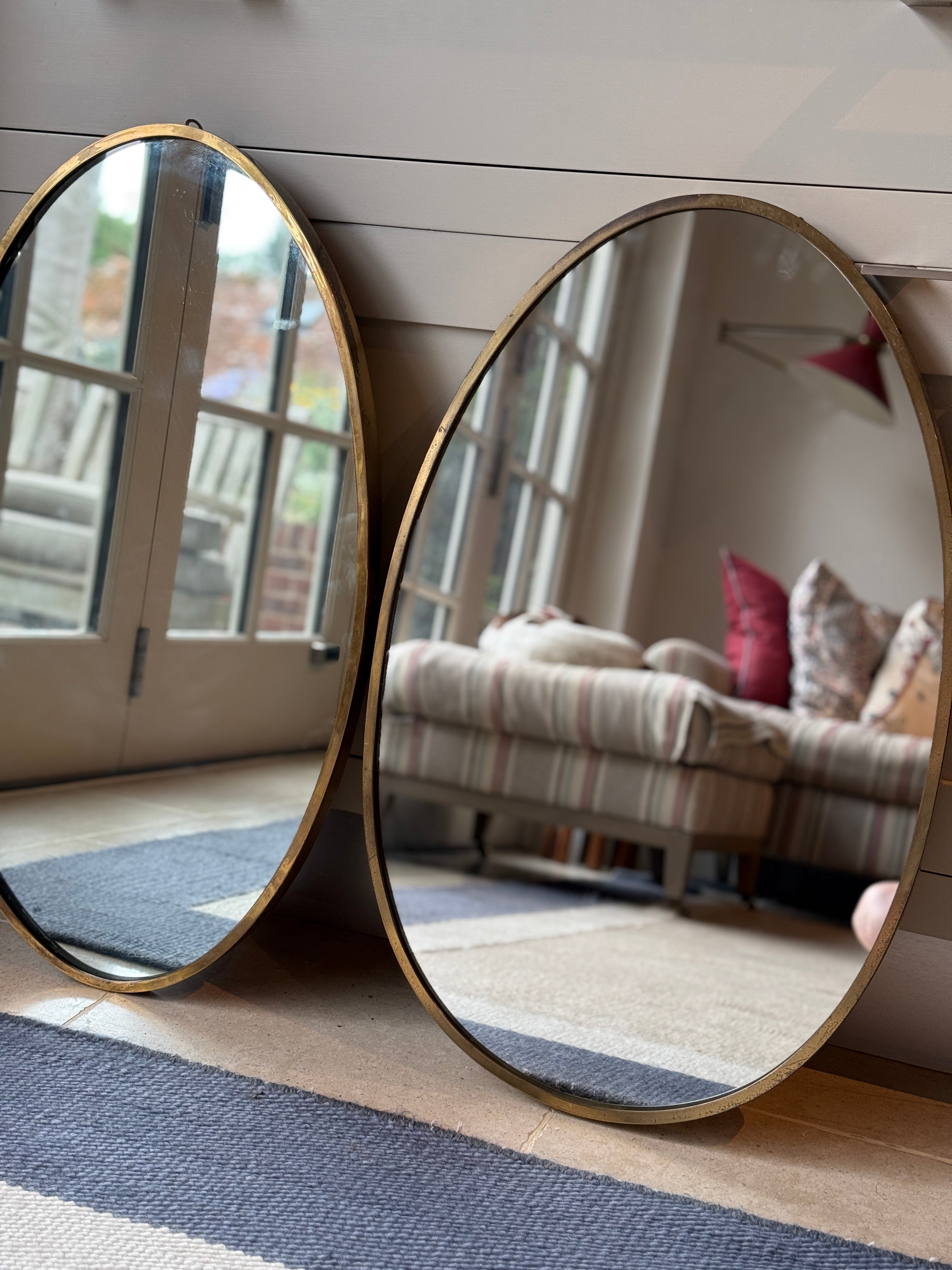 Near Matching Pair of Oval Italian Brass Mirror
