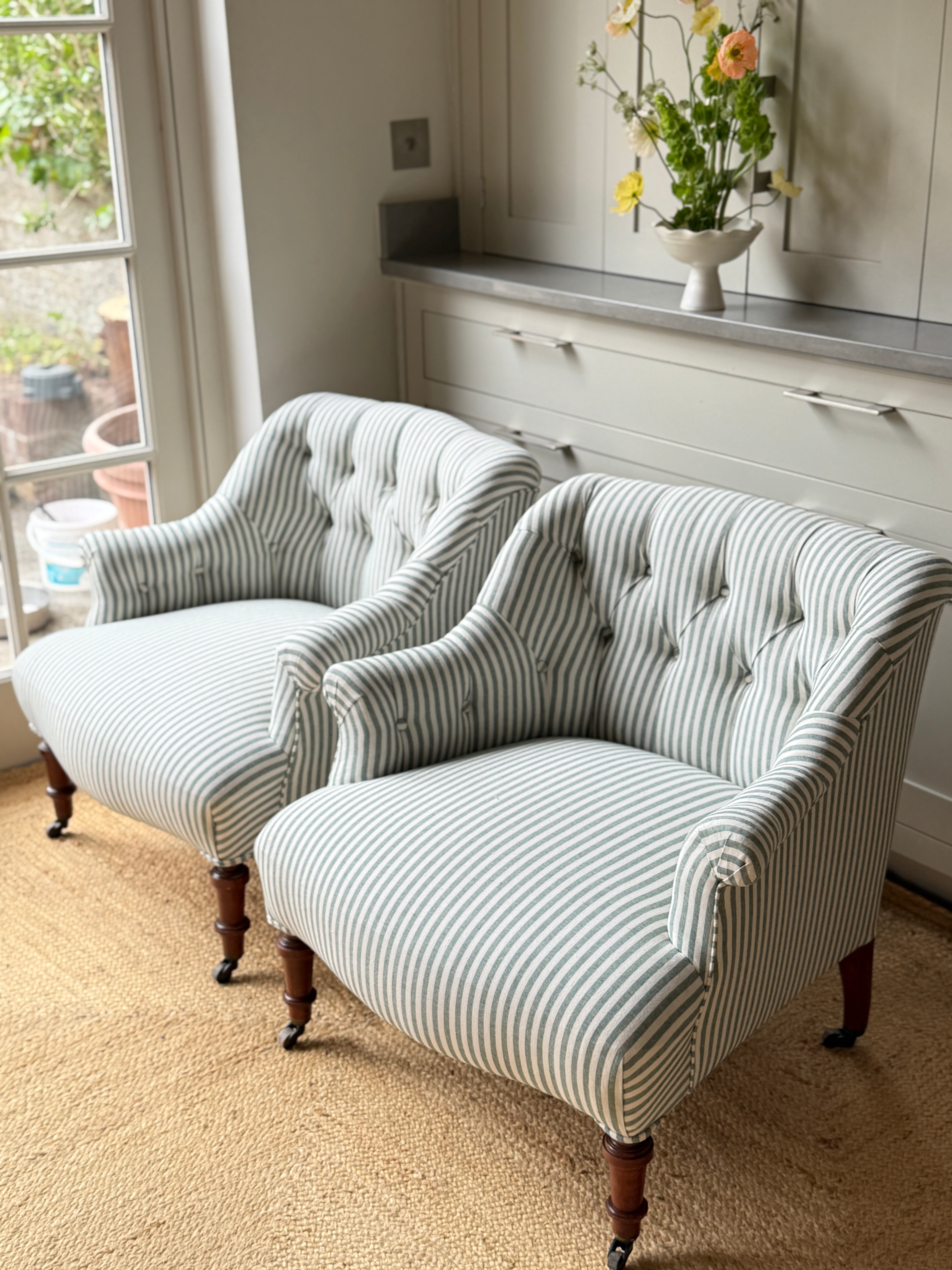 A Pair of French Napoleon III Button-Back Fauteuils