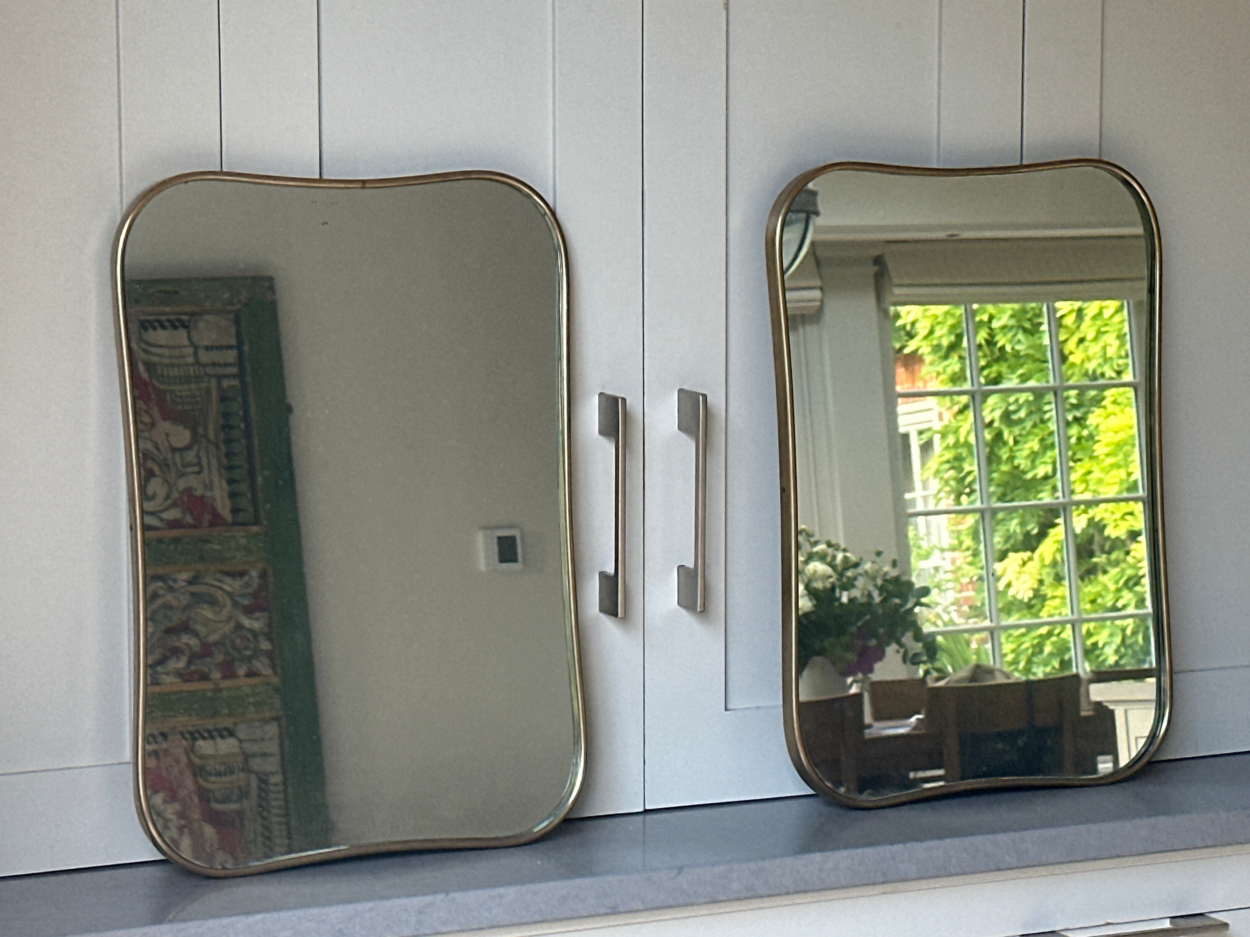 Matching Pair of Small Italian 1950s Brass Shield Mirrors