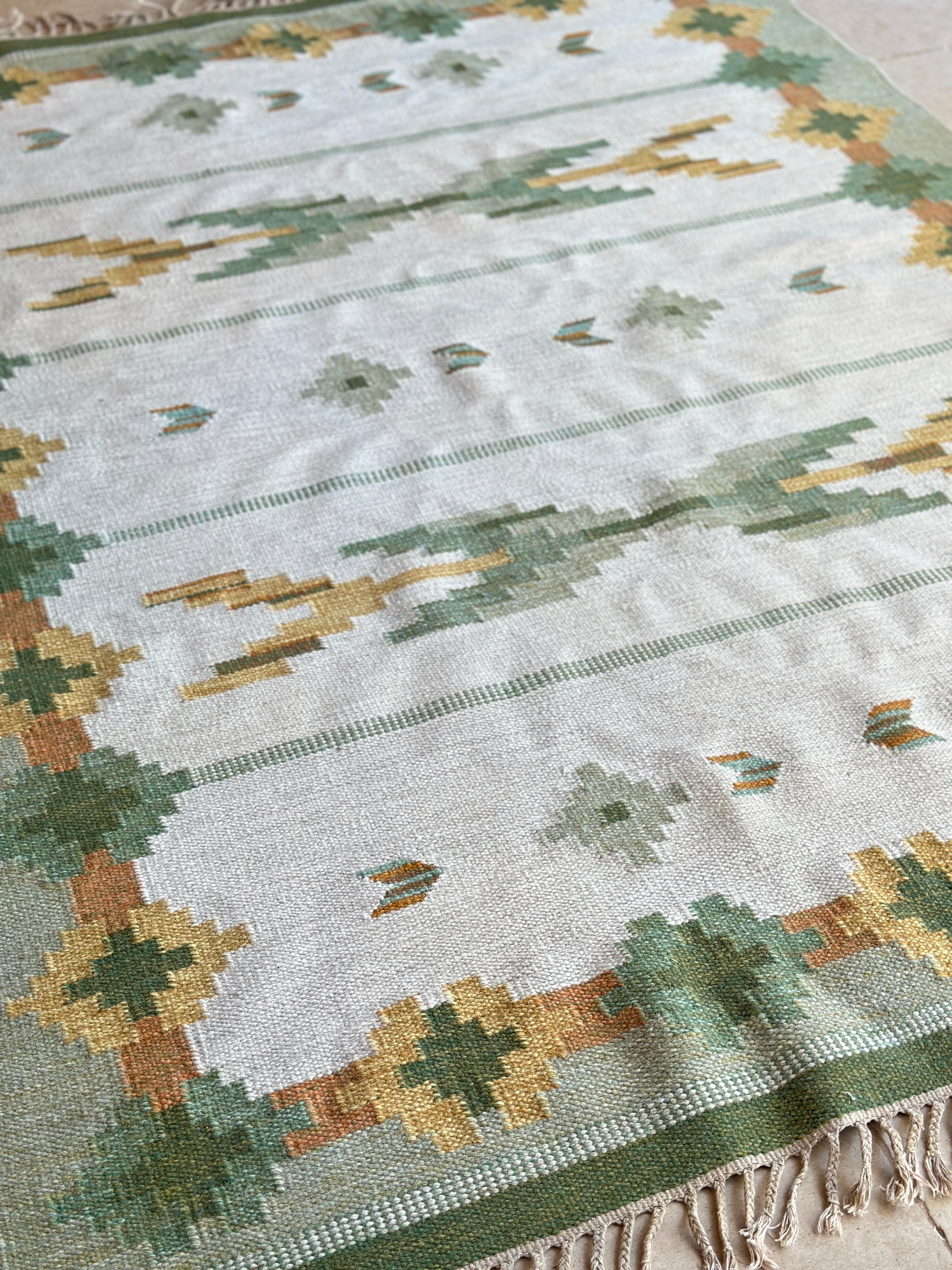 Vintage Swedish Flat Weave rug with green tones.