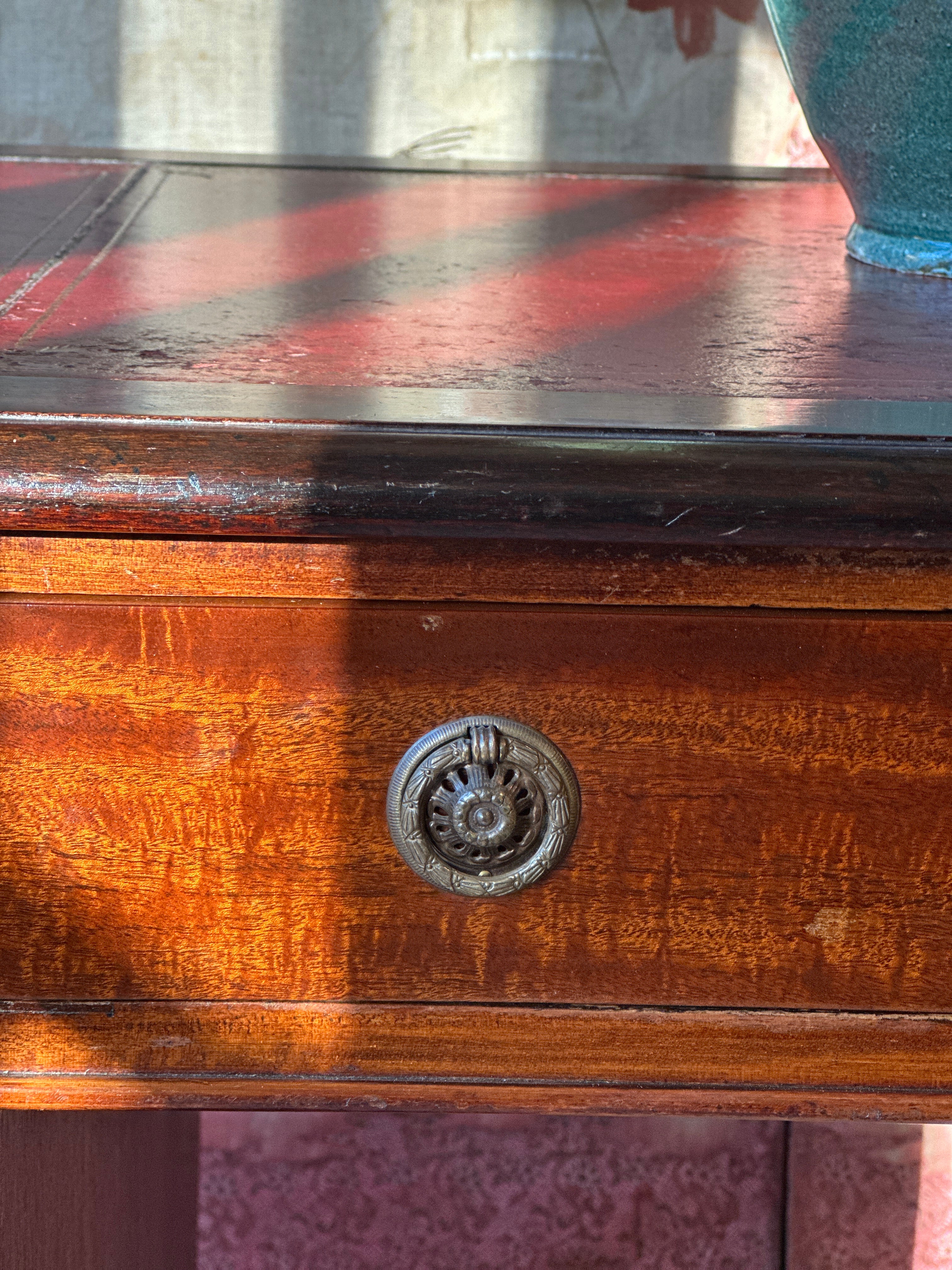 Amazing 19th Century Mahogany Desk with well worn Red Leather Top