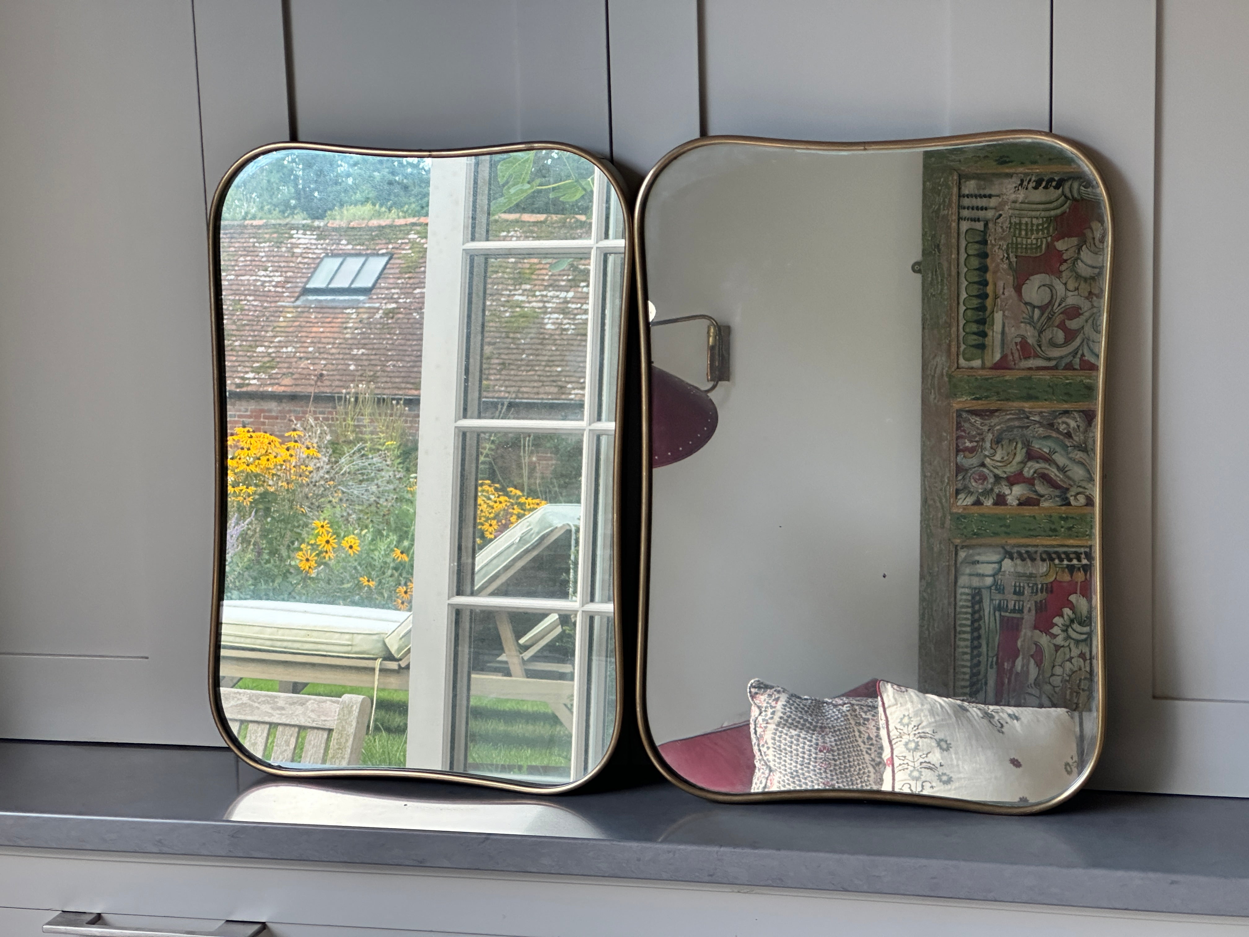 Matching Pair of Small Italian 1950s Brass Shield Mirrors