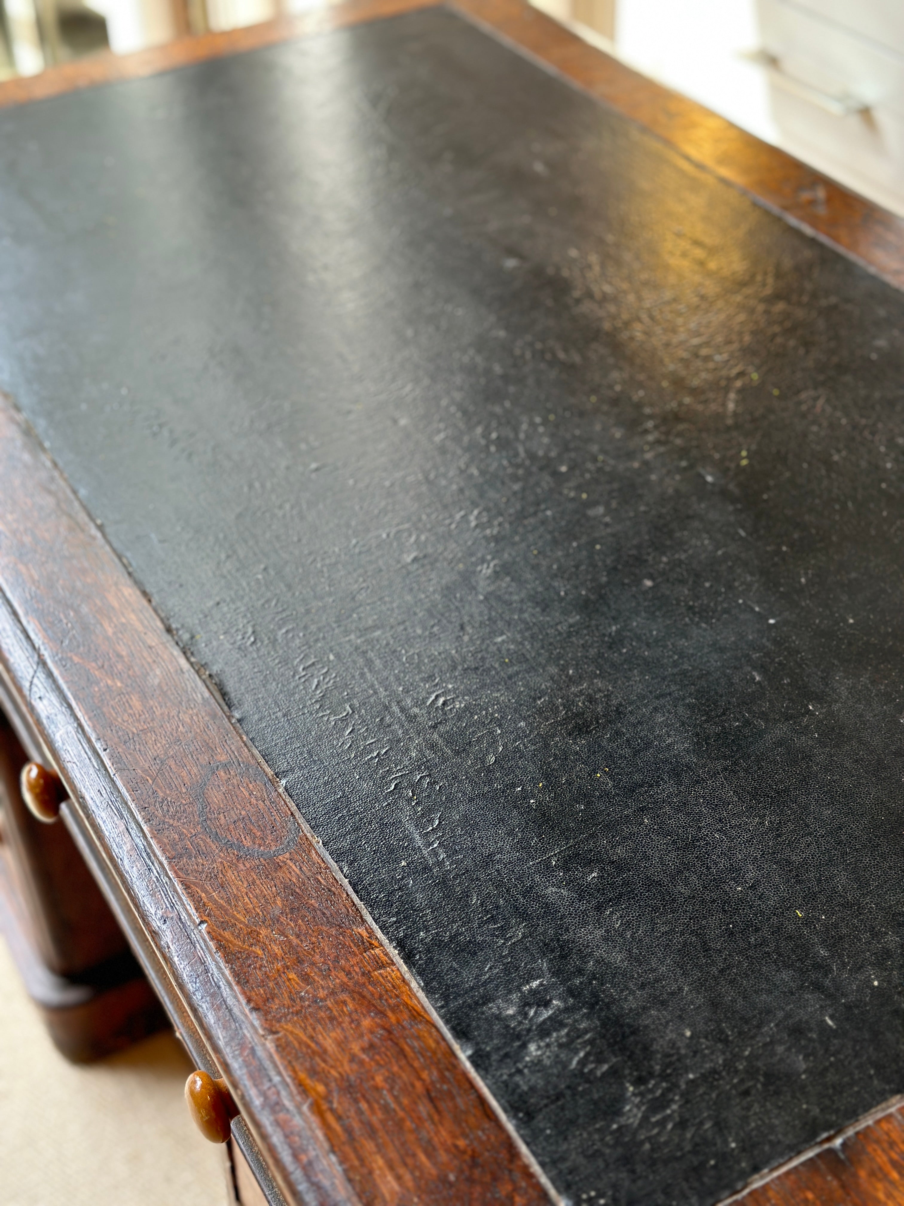 Antique Oak Desk with leather top on castors