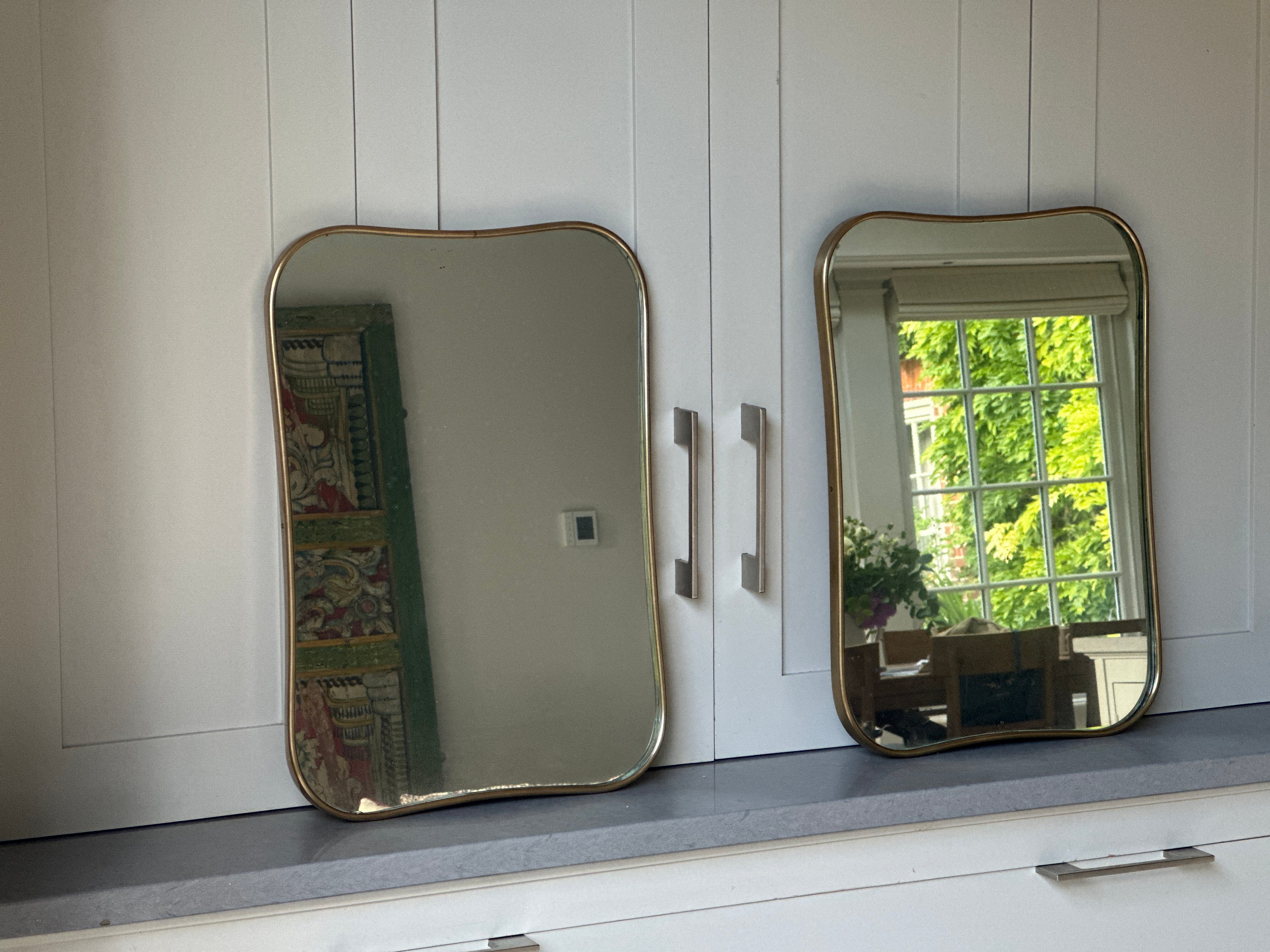 Matching Pair of Small Italian 1950s Brass Shield Mirrors