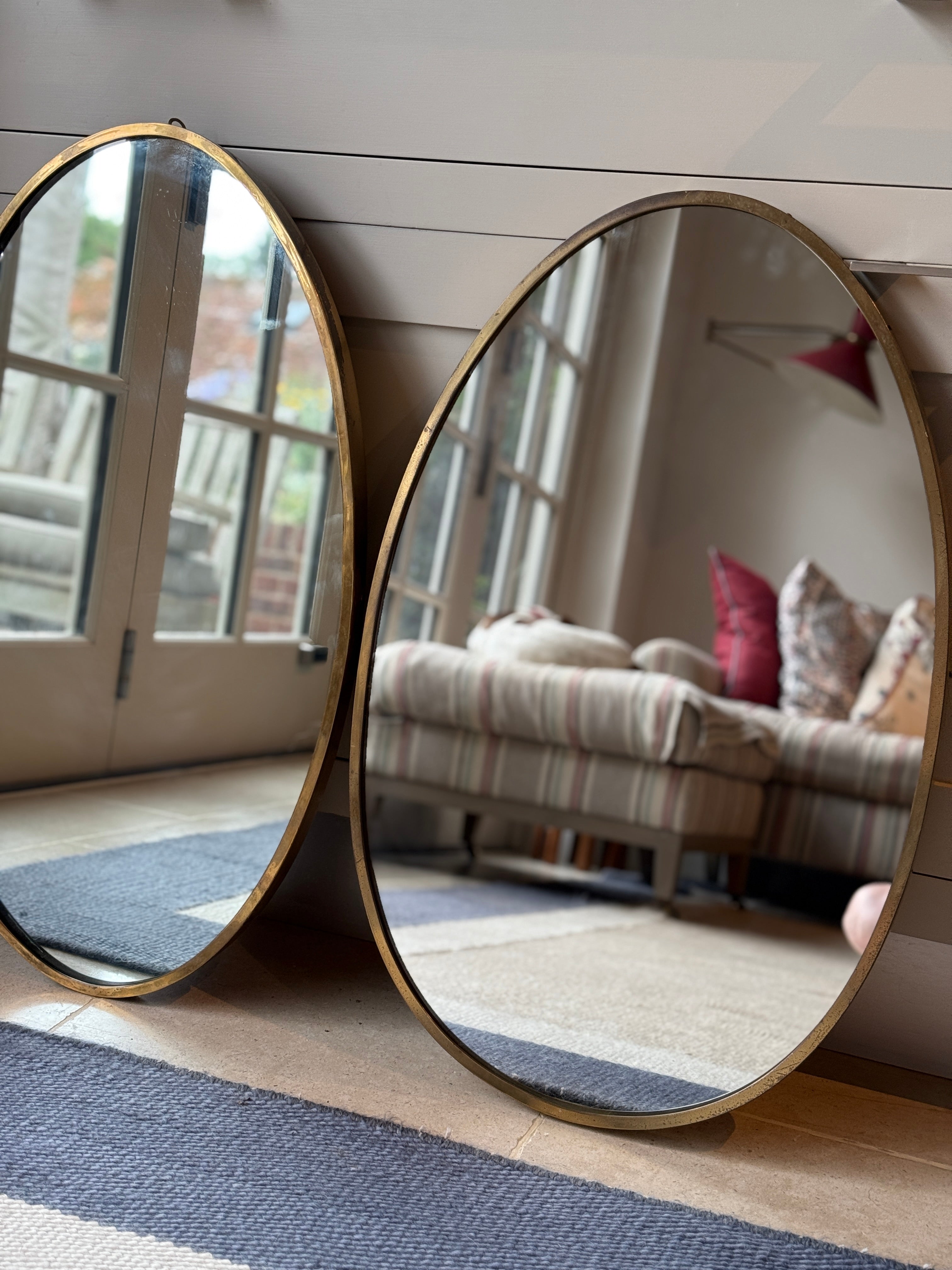 Near Matching Pair of Oval Italian Brass Mirror