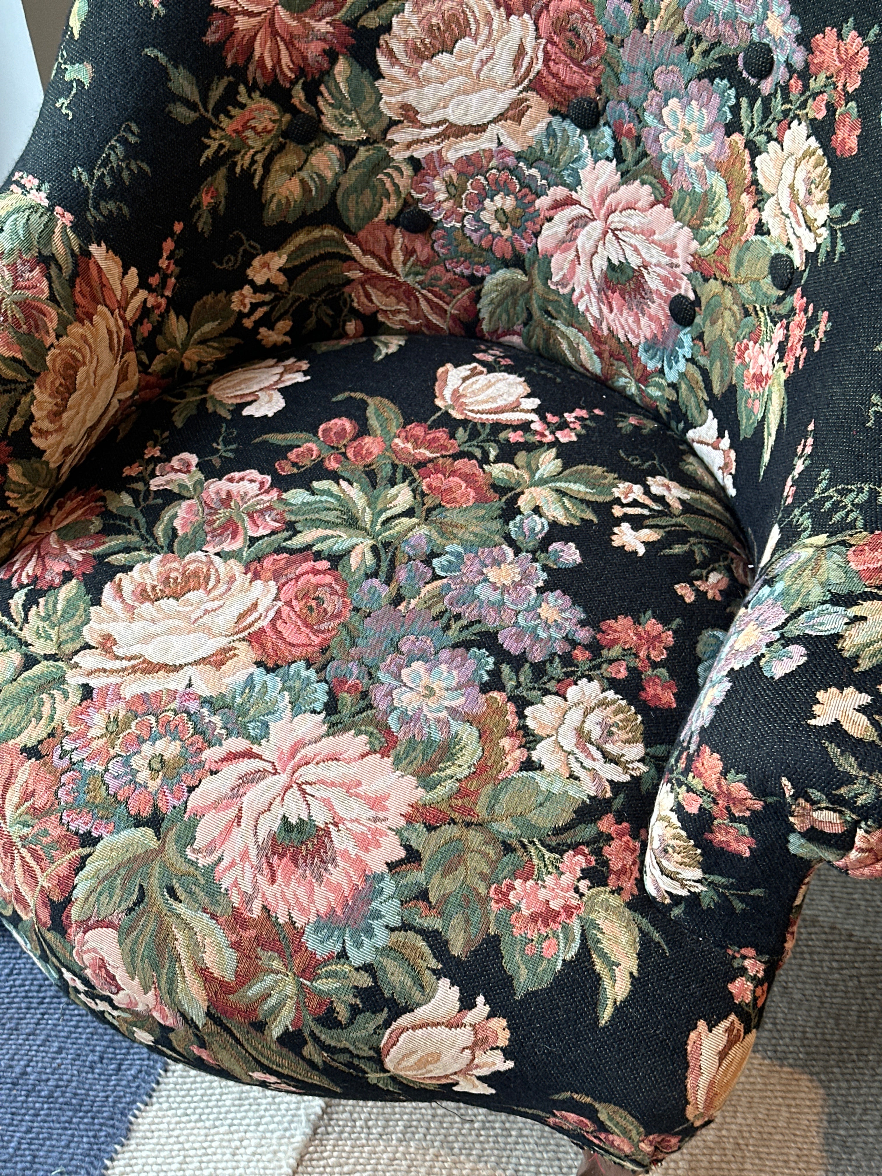 Pair of French Tub Chairs with original black floral tapestry fabric.