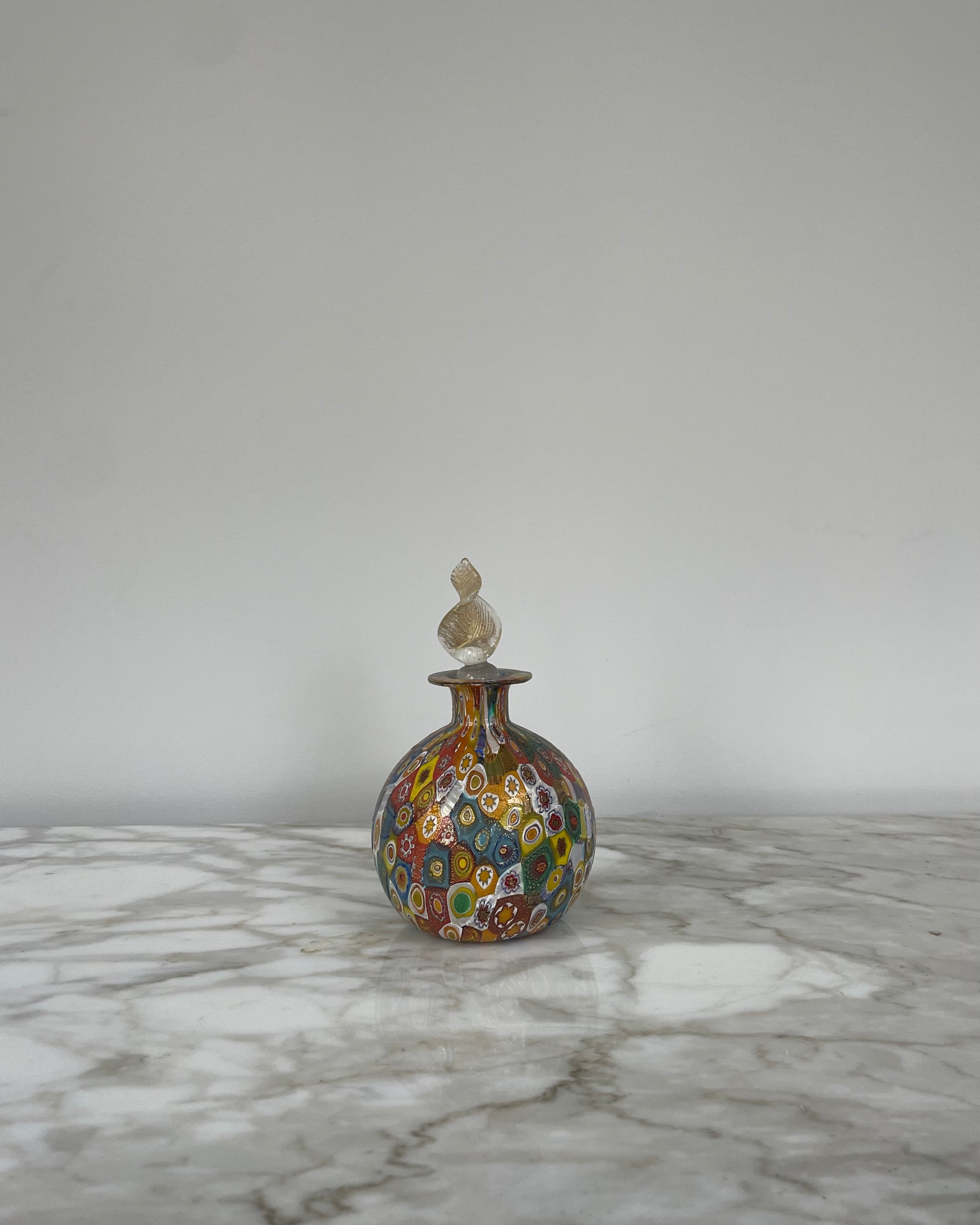 A Collection of 3 Murano Scent Bottles