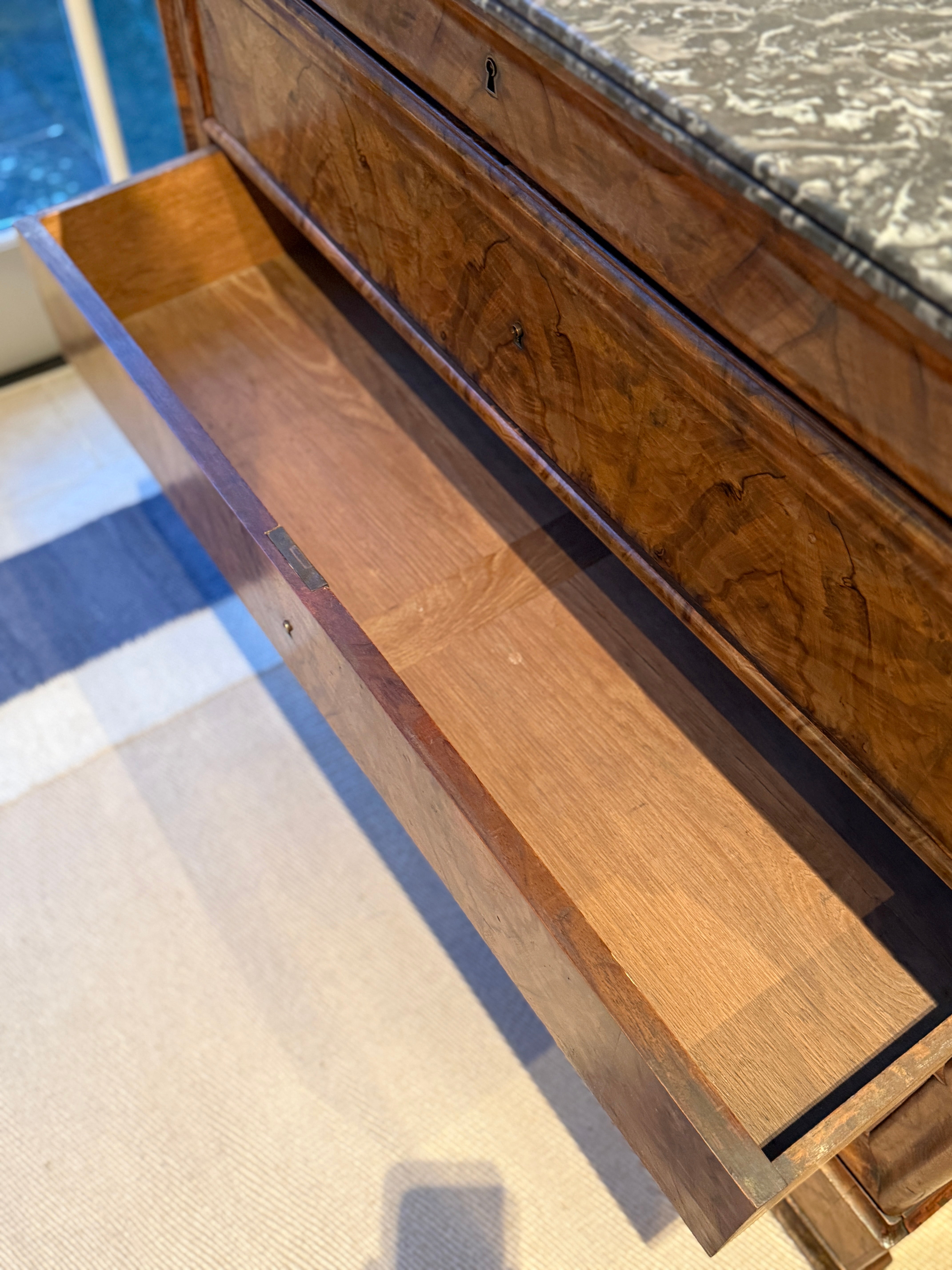 French Louis-Philippe walnut commode with grey marble top, circa 1835–1848