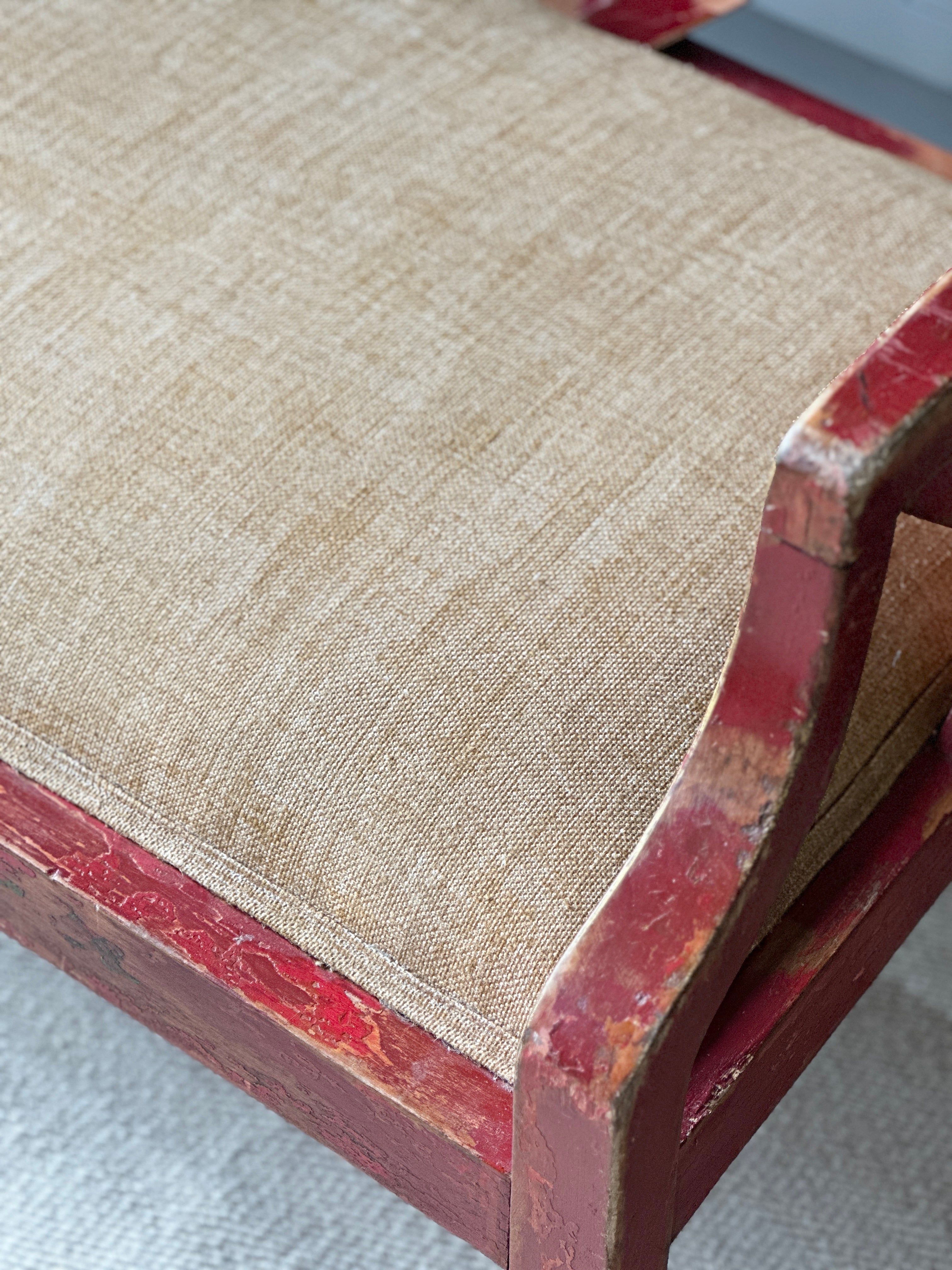 Charming Red Chinoiserie Sofa/Bench with well worn decorative paintwork.