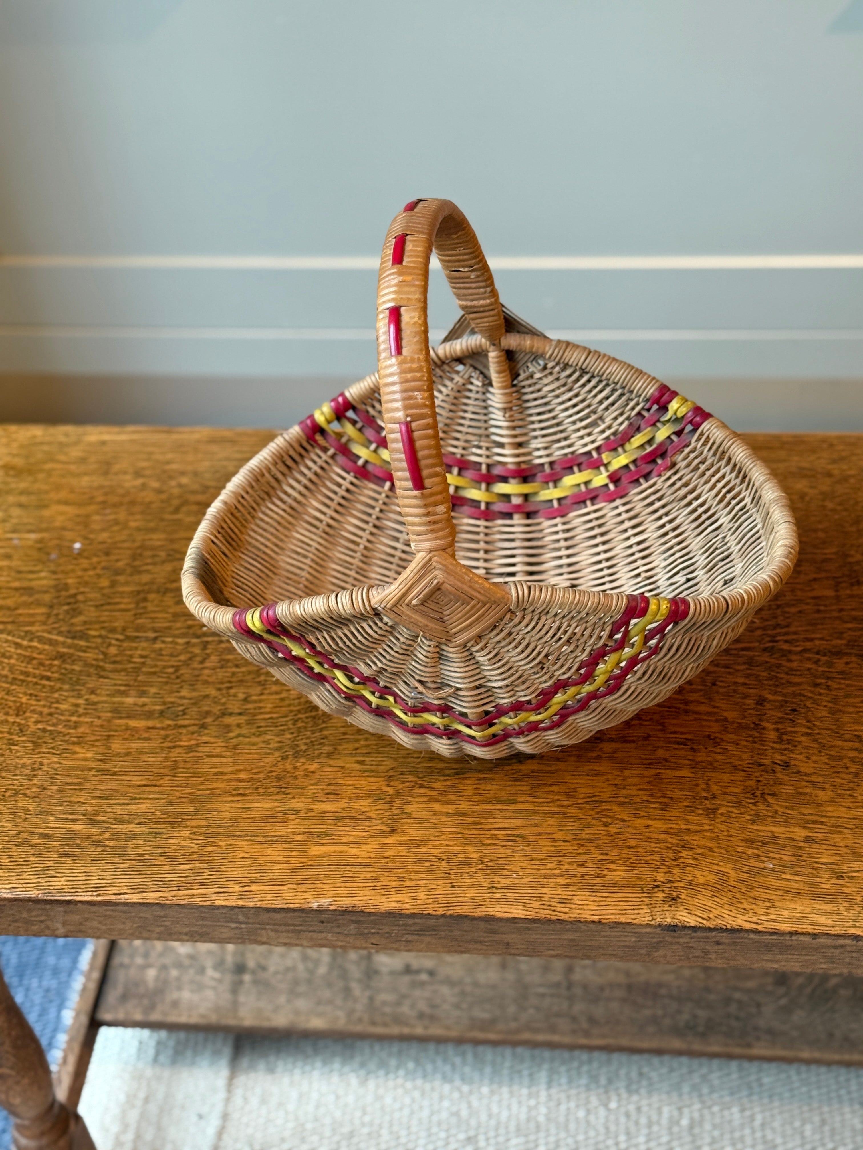 Small Decorative Basket with Red and Yellow Accents