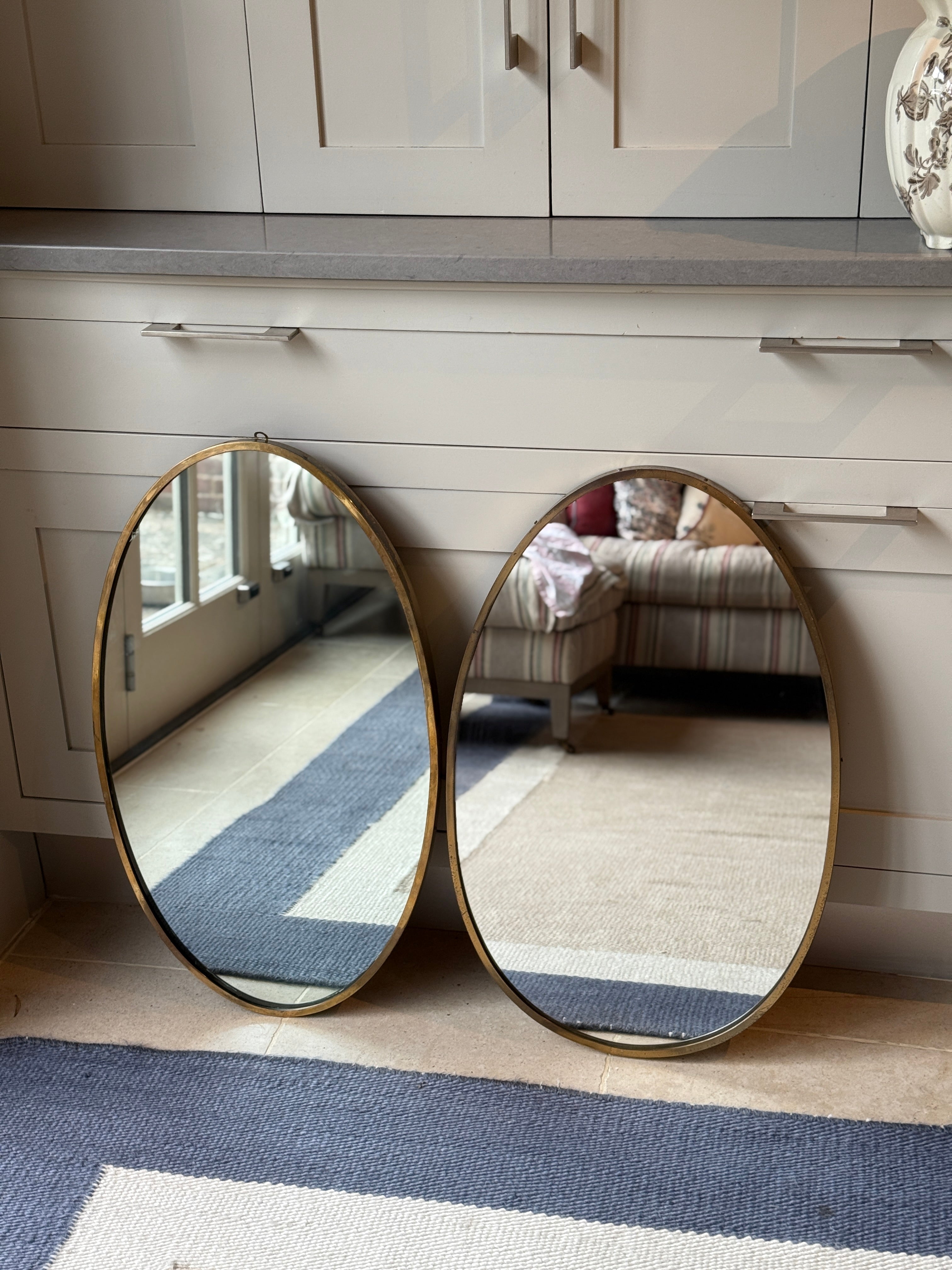 Near Matching Pair of Oval Italian Brass Mirror