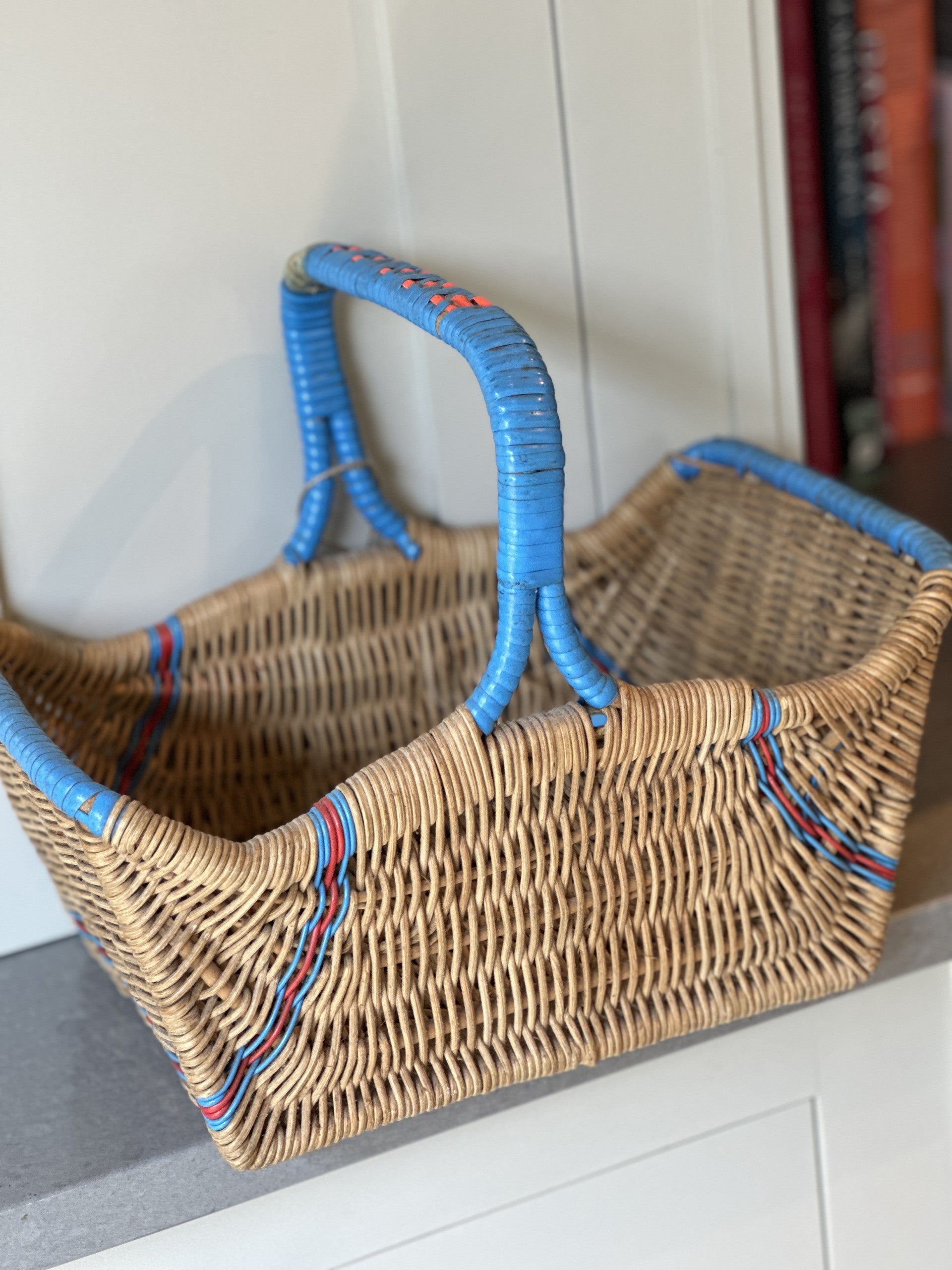 Vintage Wicker Basket with Blue and Red Accents