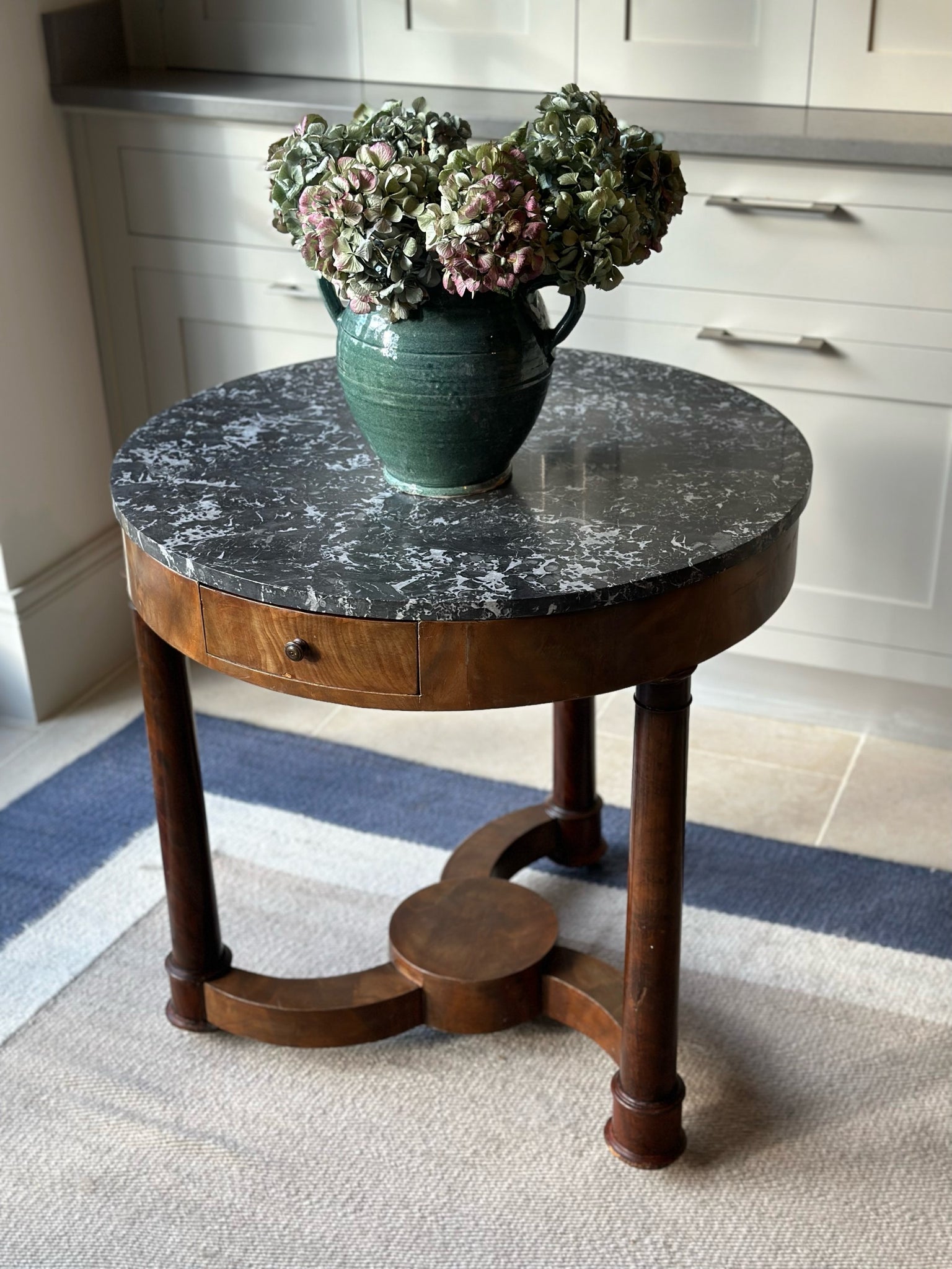 Small Gueridon with grey marble top and spinning legs