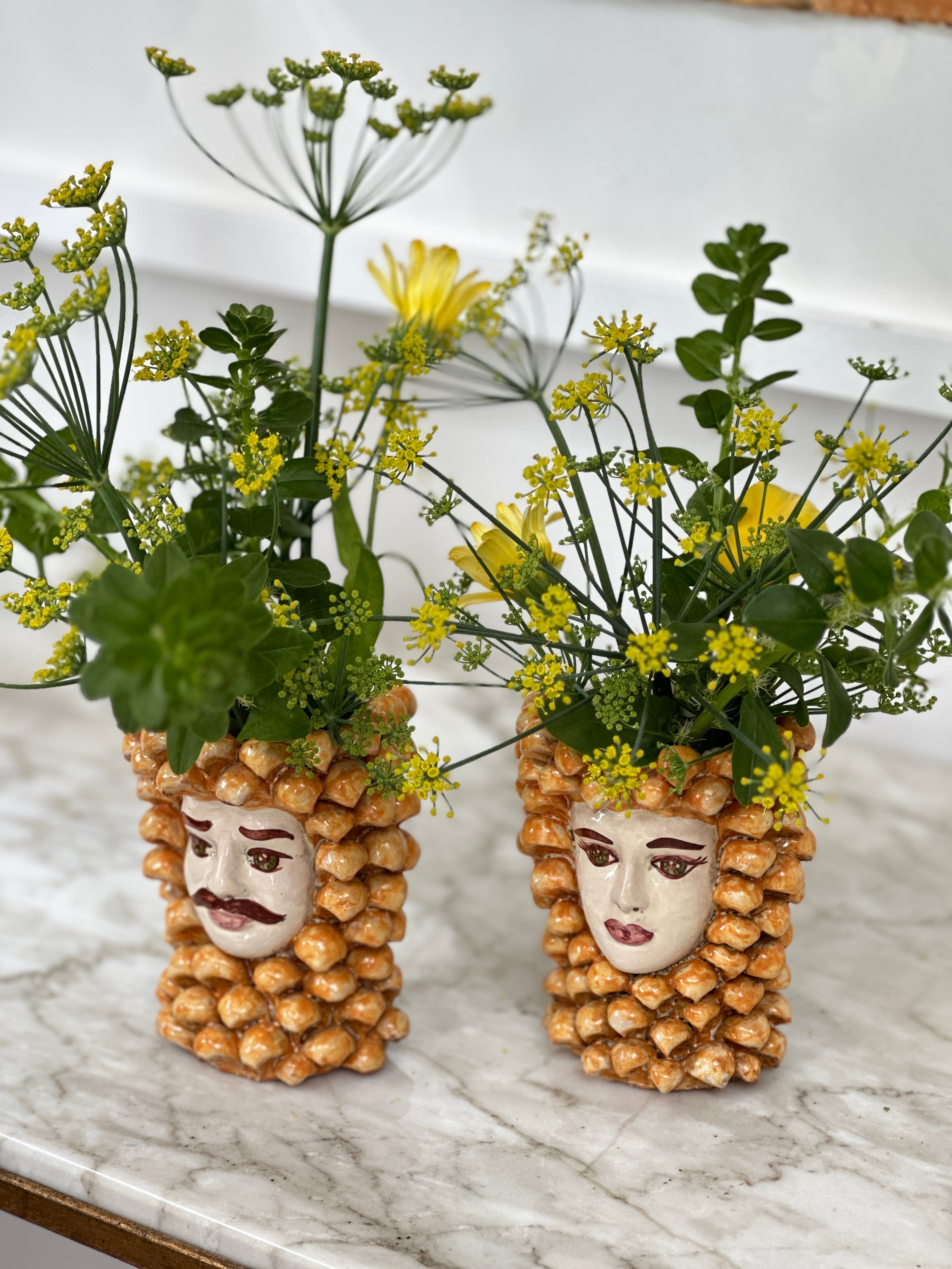 A Small Pair of Hand Painted Pine Cone Heads