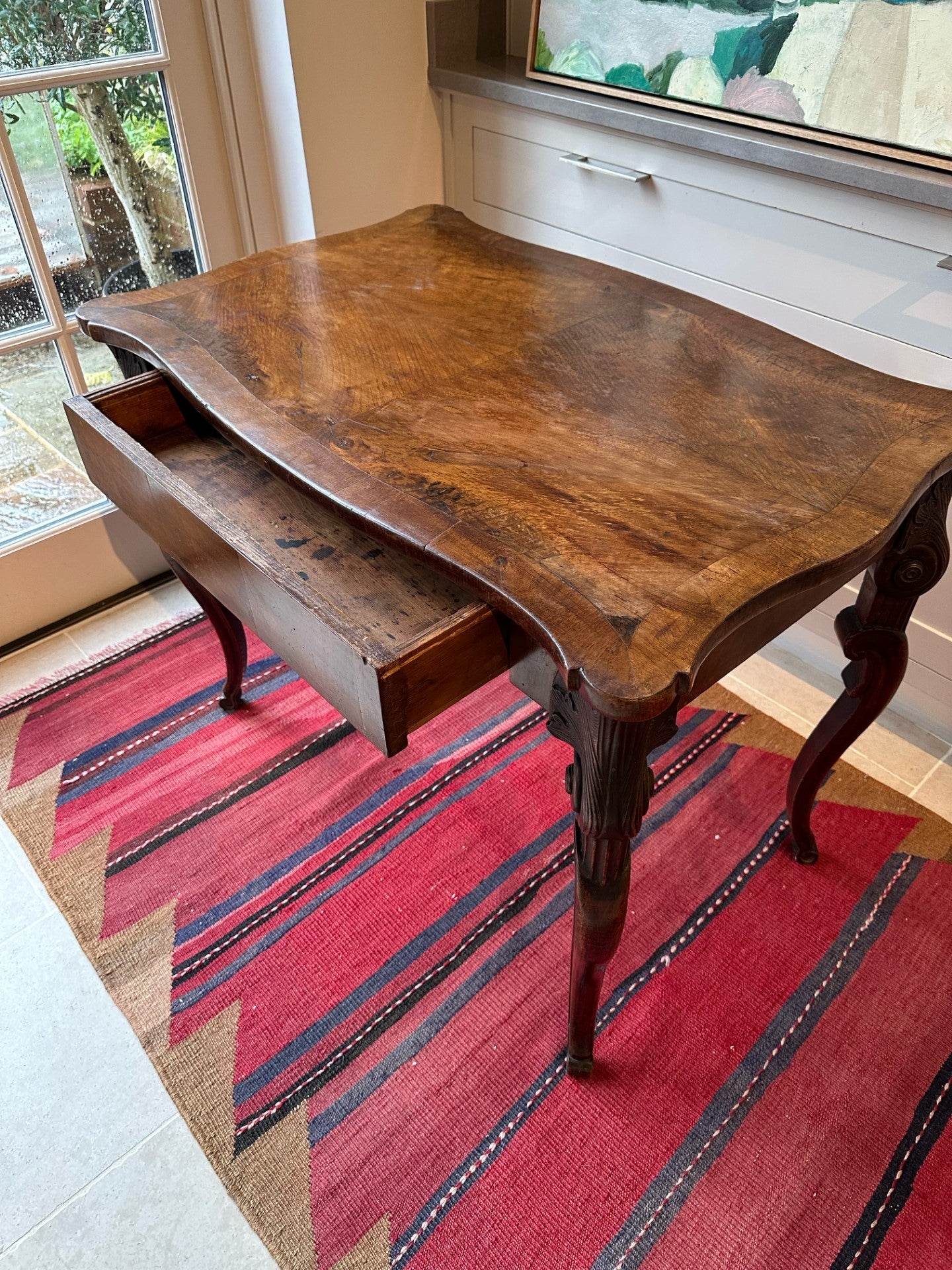 Charming 19th Century Italian Table with amazing carved cabriole legs and large single drawer.