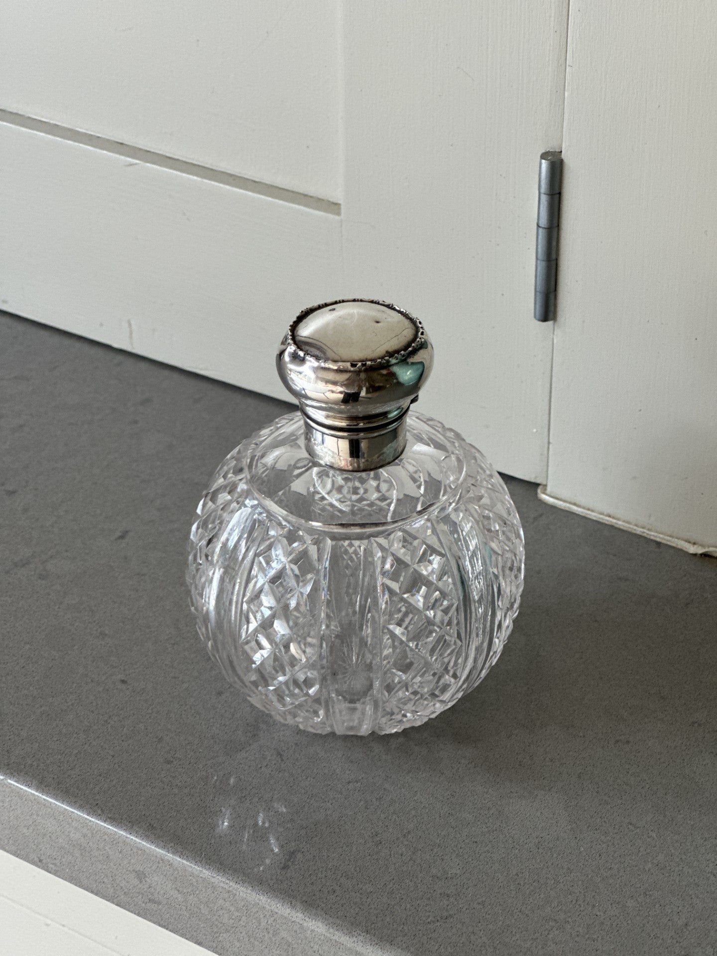 Cut Glass Decanter with Silver Top