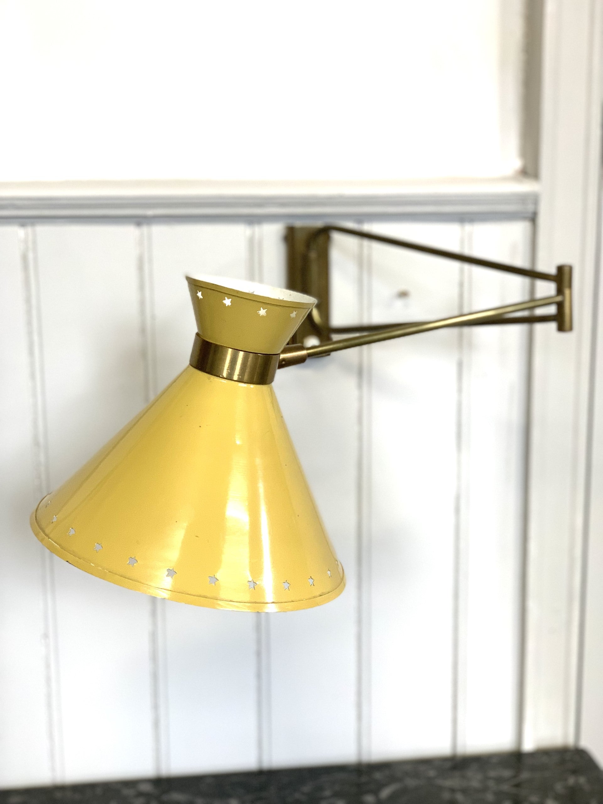 Mustard yellow Rene Mathieu Diabolo Wall light