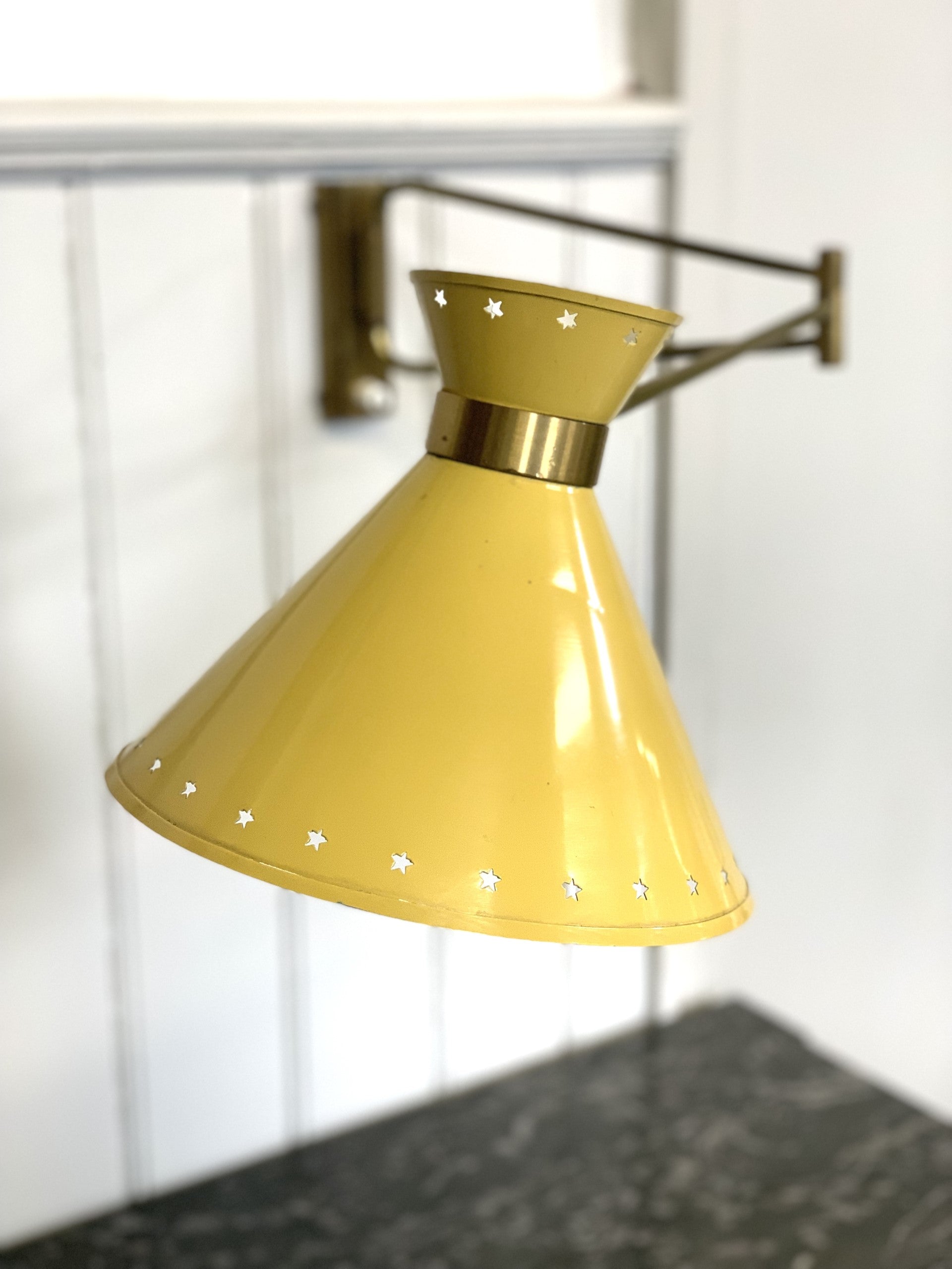 Mustard yellow Rene Mathieu Diabolo Wall light