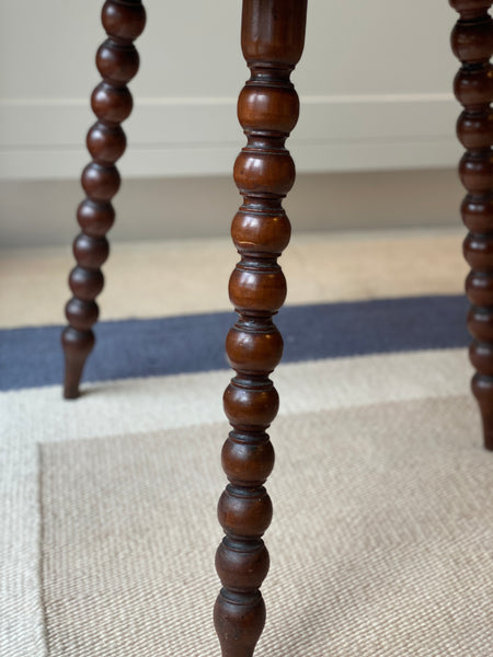 Antique walnut tripod table