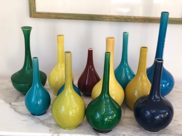 A collection of 19th Century Chinese and Japanese monochrome bottle neck vases