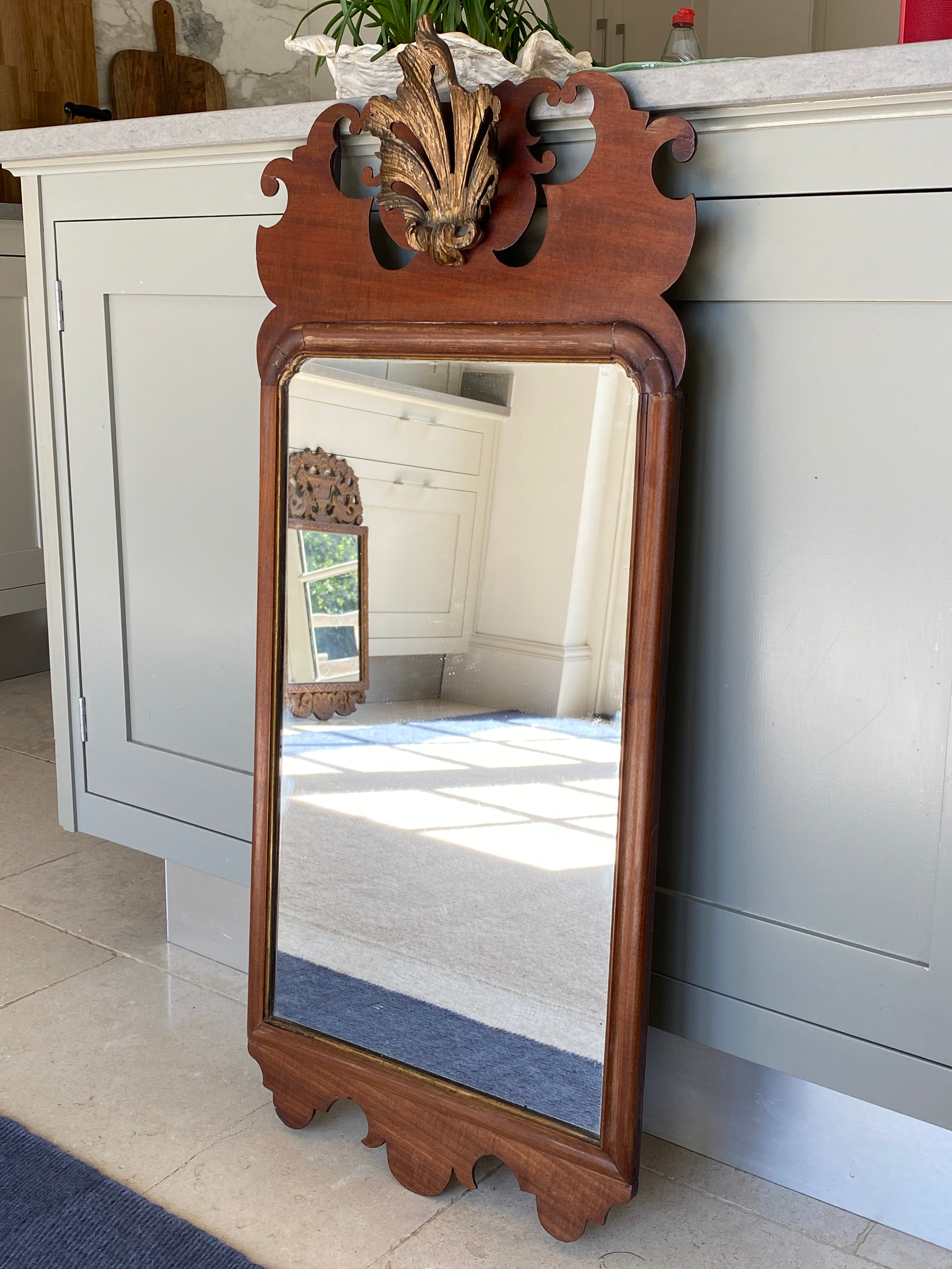 George III Mahogany Fretwork Mirror with carved wood shell