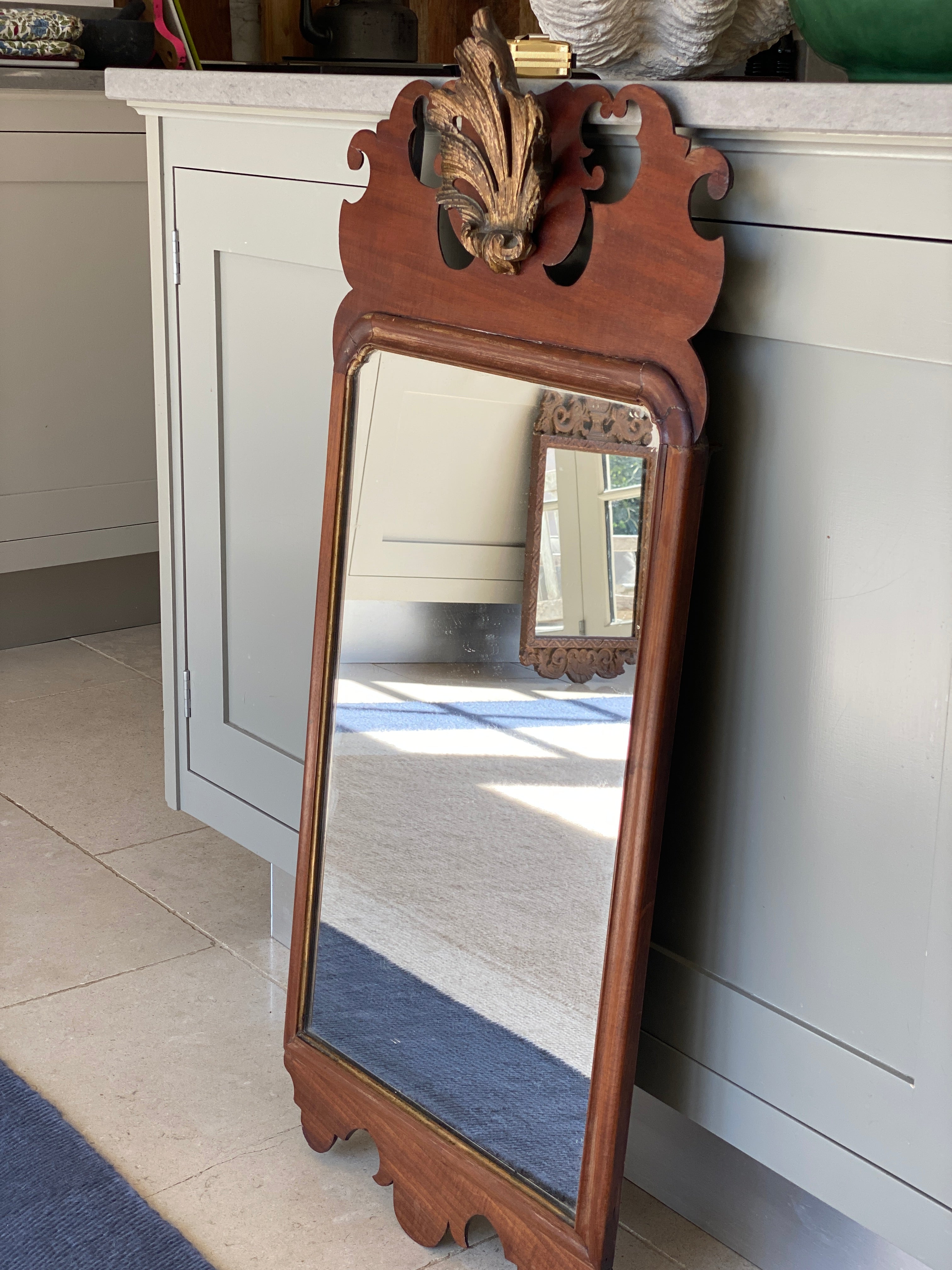 George III Mahogany Fretwork Mirror with carved wood shell