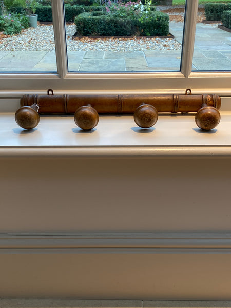 A small French faux bamboo coat/hat rack