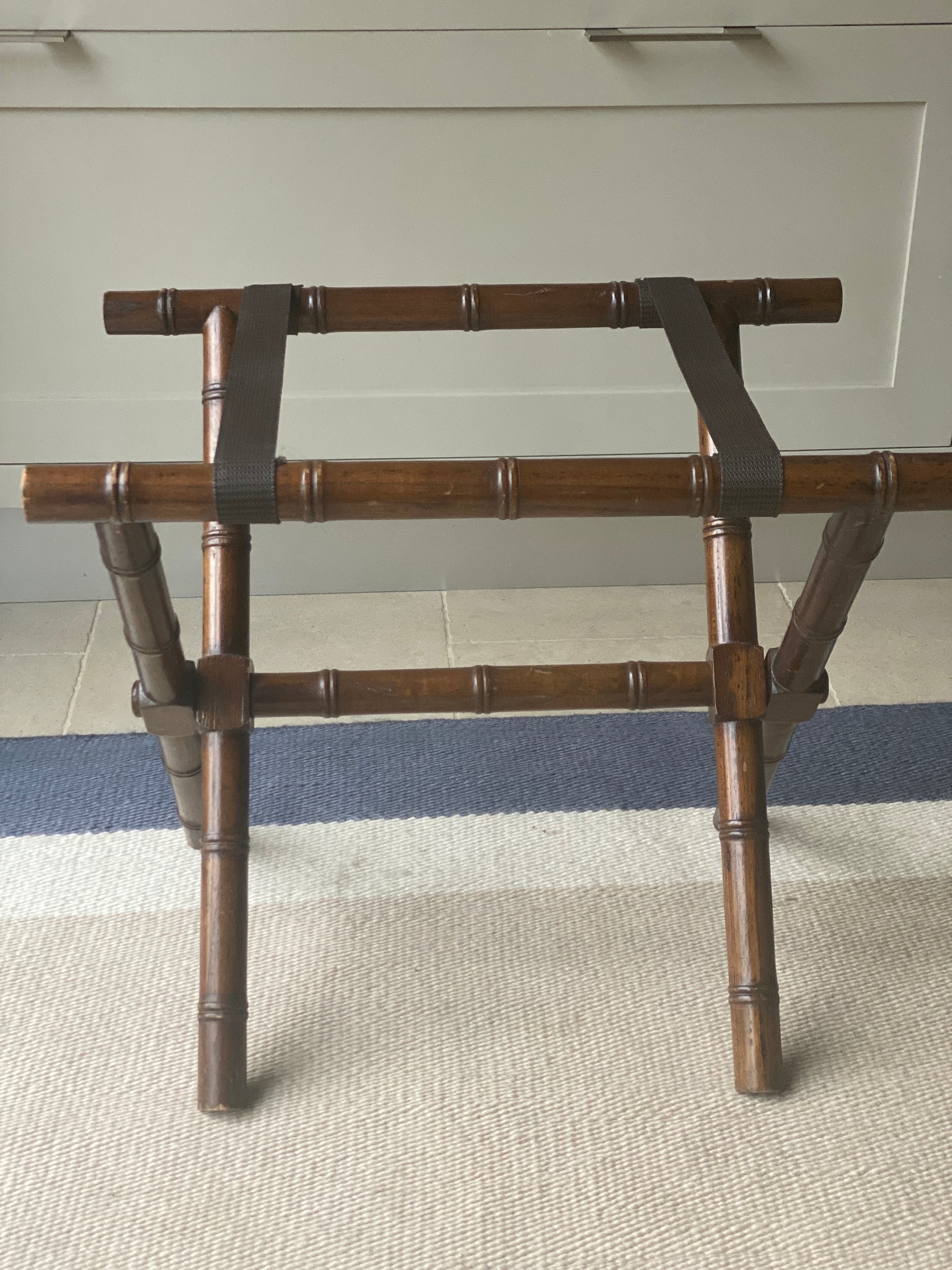 Attractive Faux bamboo luggage rack