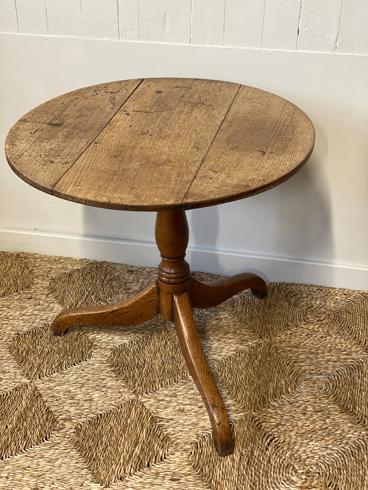 Faded oak tilt top table