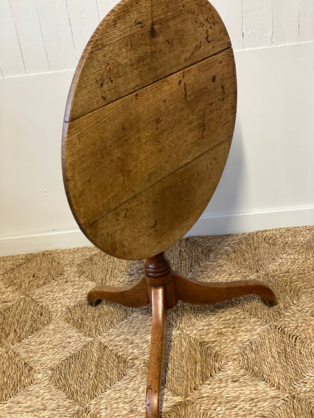 Faded oak tilt top table