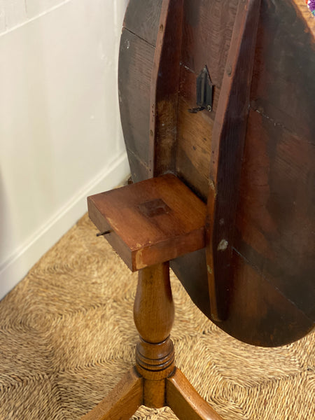 Faded oak tilt top table