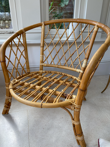 A lovely small pair of vintage cane chairs