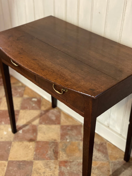 Oak side table with bowed front