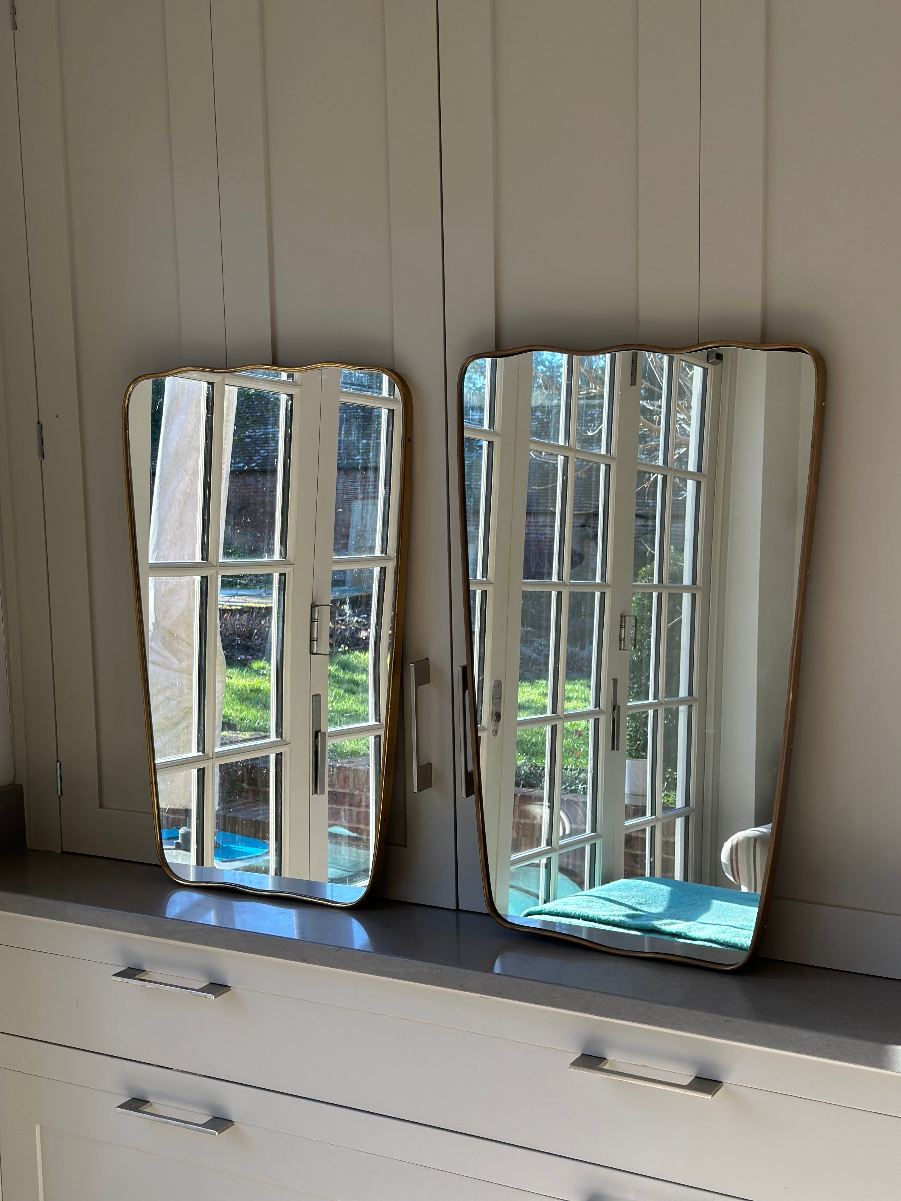 A Pair 1950s Italian Brass Mirrors with Wavy Edge