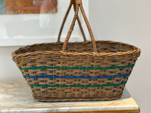 Vintage wicker shopper with blue and green accents
