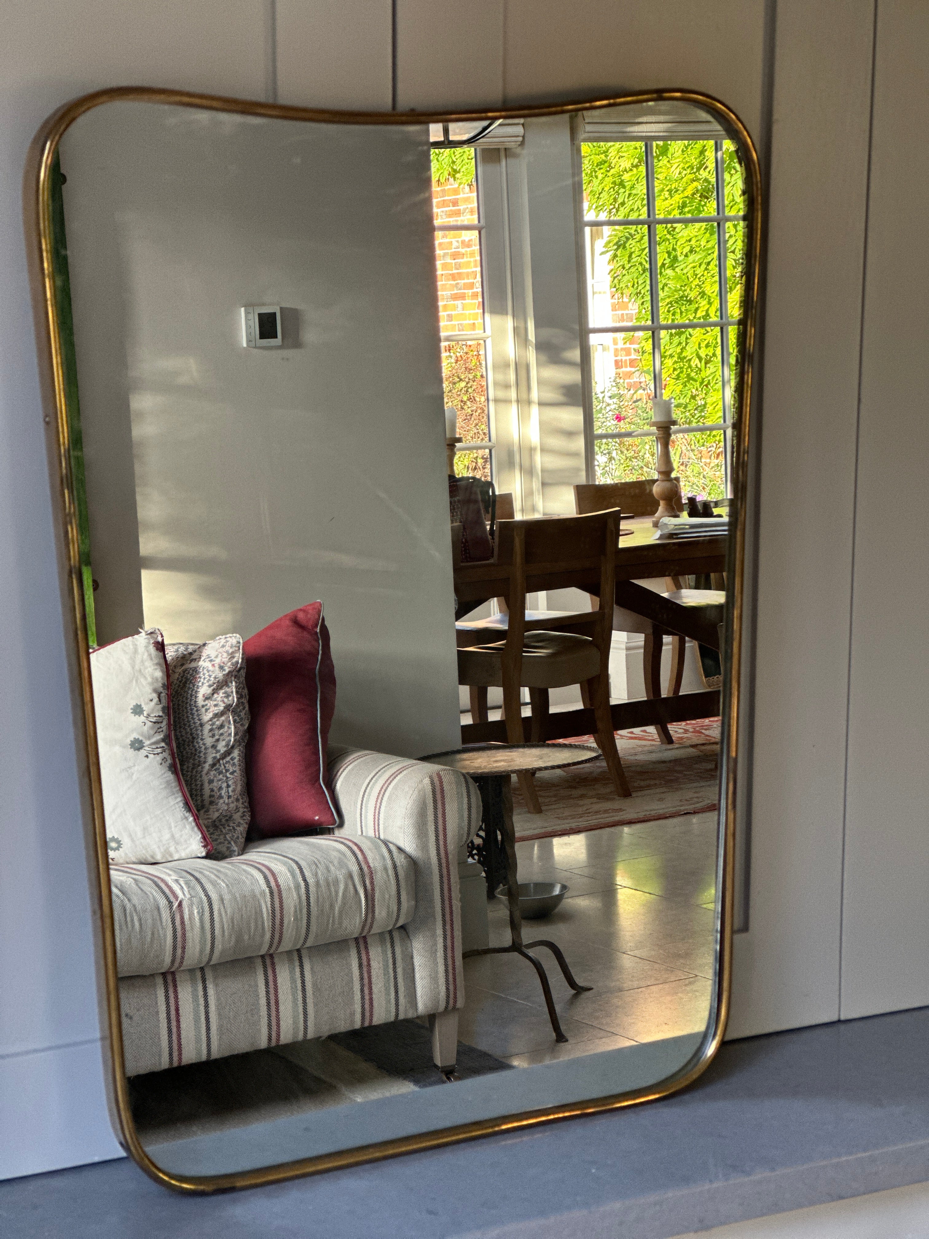 Mid-Century Brass Shield Mirror (62.5 by 46.5)