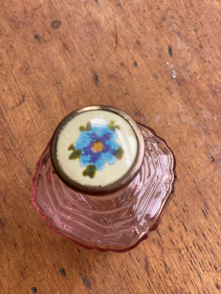 Really pretty pink perfume bottle with enamel top