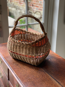 Vintage French wicker basket with red striping