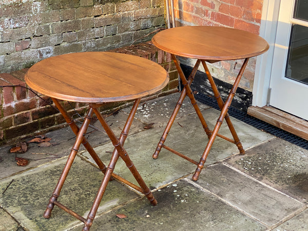 A pair of vintage faux bamboo folding side tables