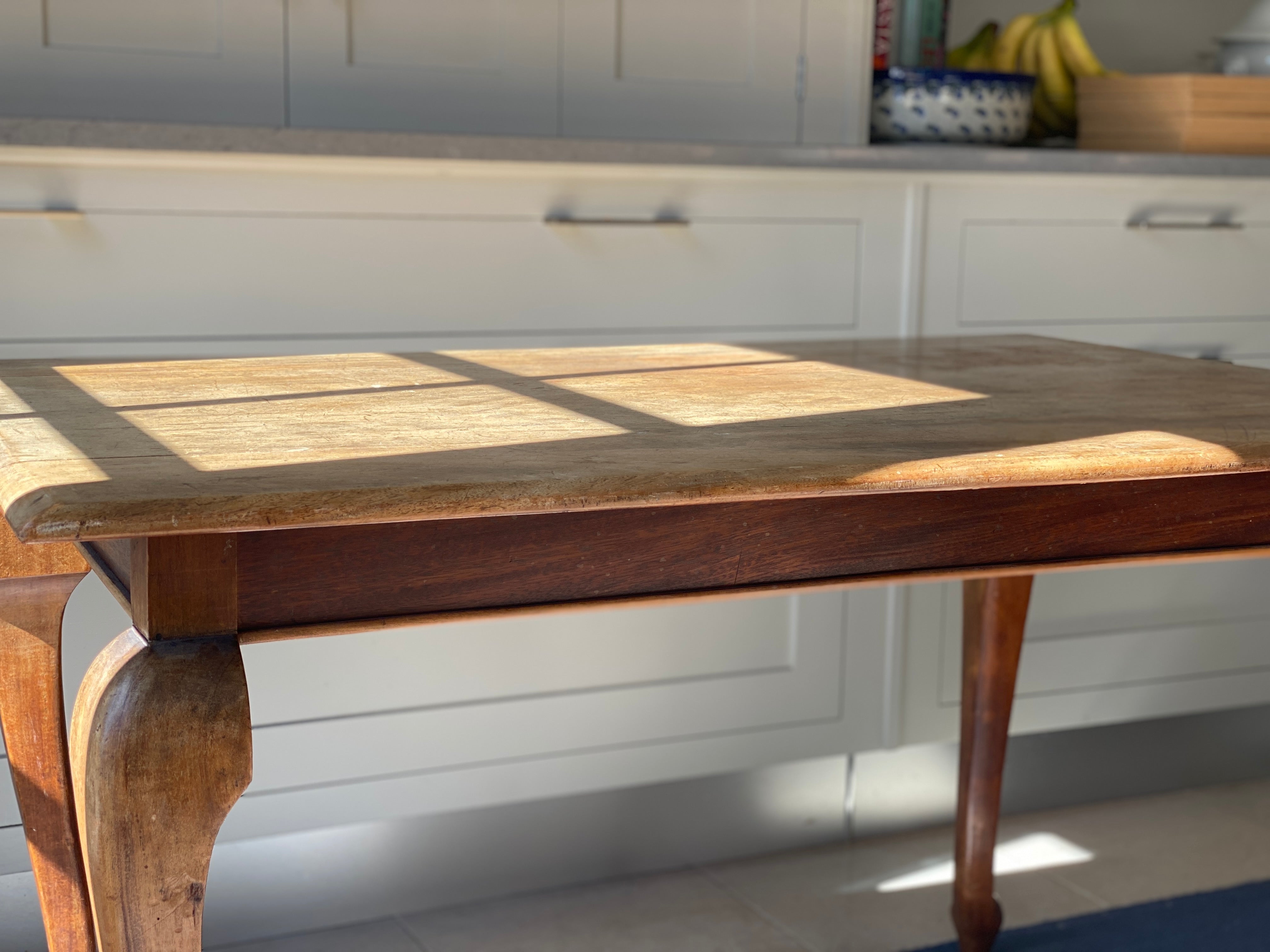 Attractive honeyed oak table with attractive cabriole legs