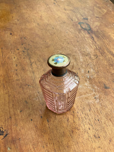 Really pretty pink perfume bottle with enamel top