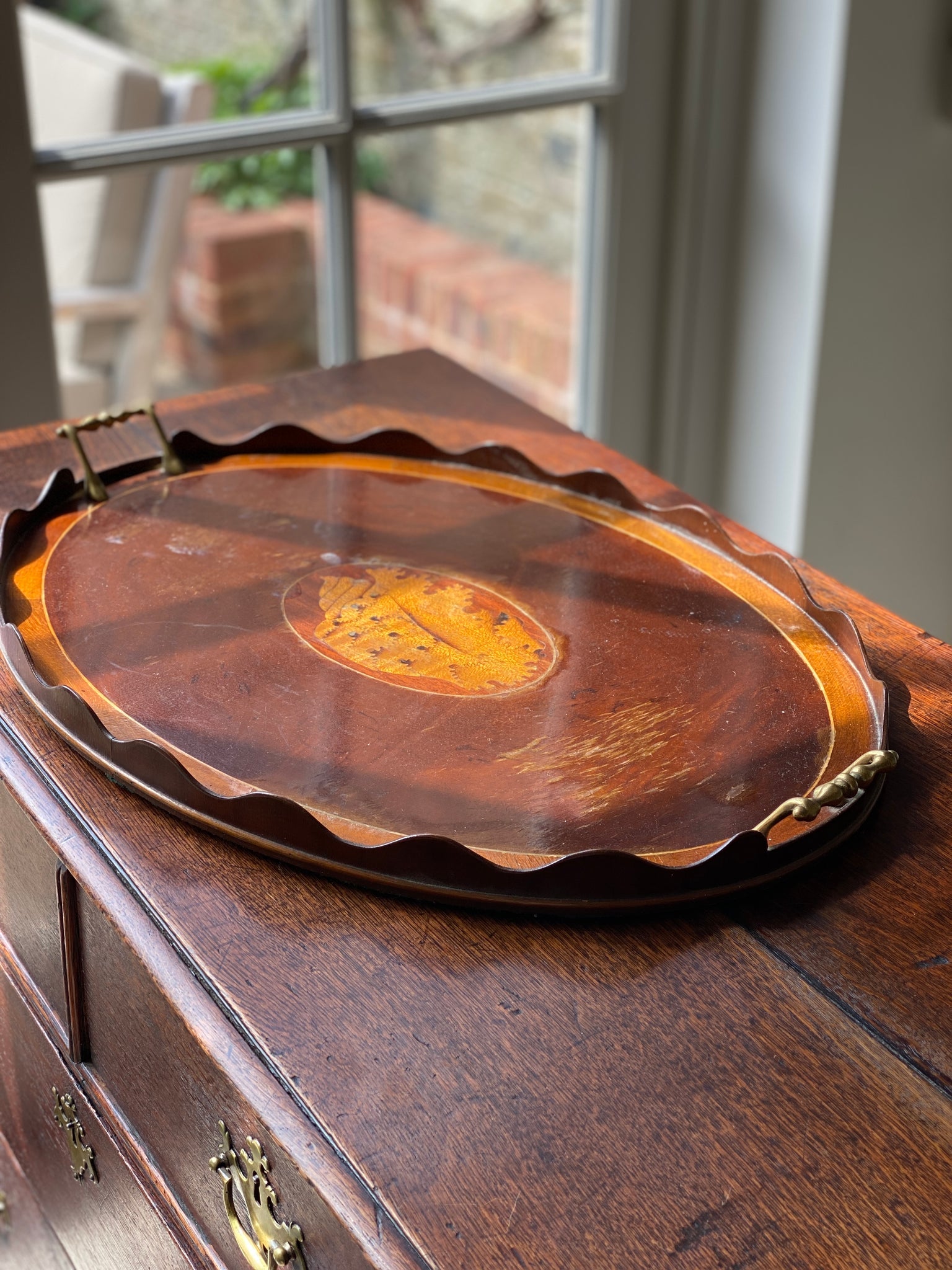 A pretty Edwardian scalloped tray with centre shell