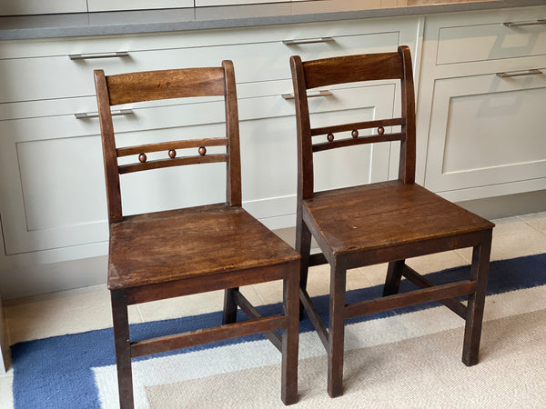 A 19th Century Pair of Suffolk Ball Back Chairs