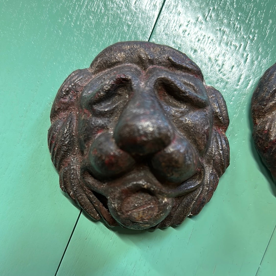 Pair of Small Cast Iron Lion Heads