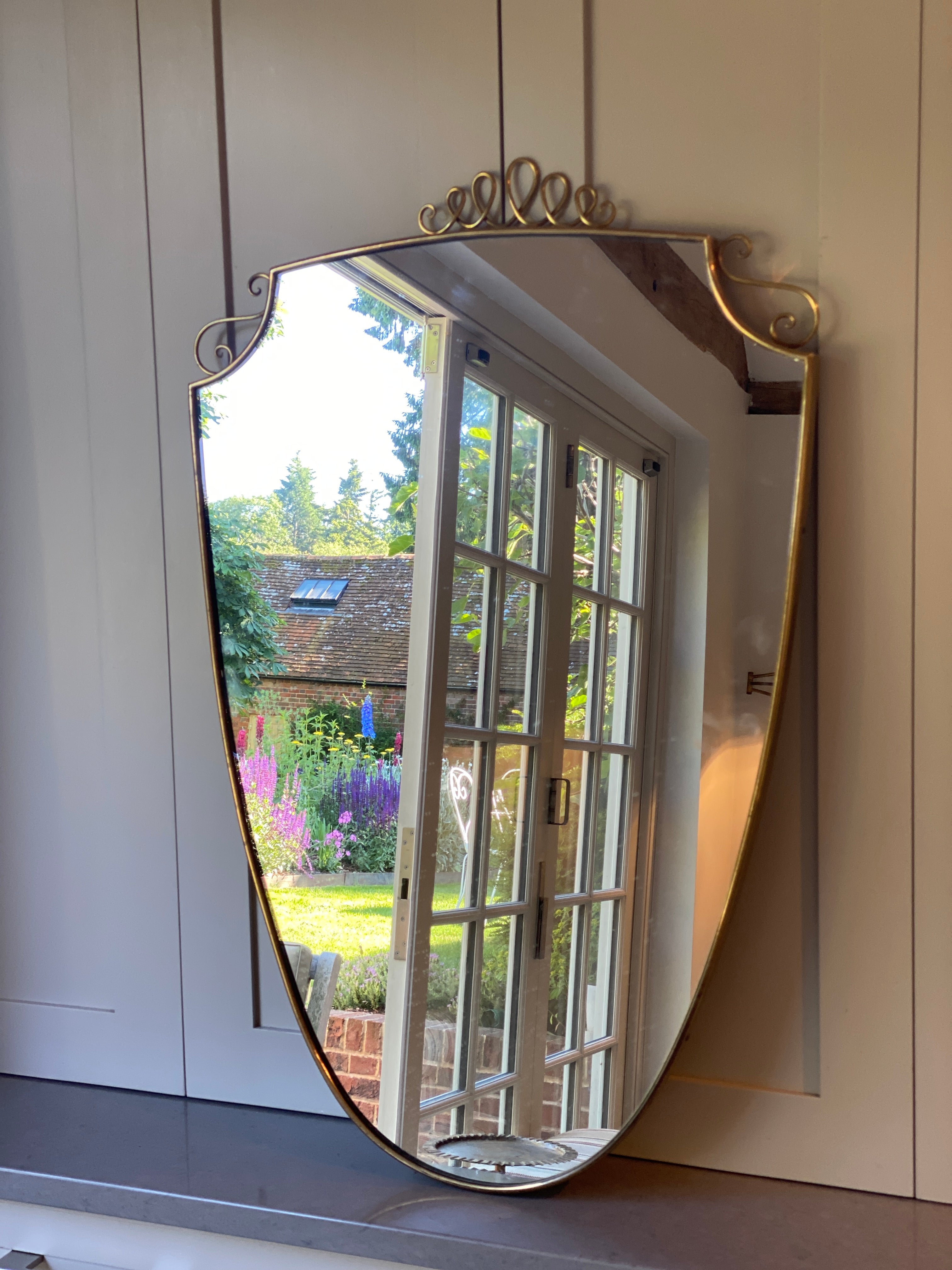 Italian Brass Shield Mirror with motif