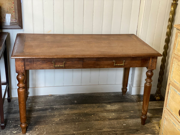 A lovely French oak desk with drawers